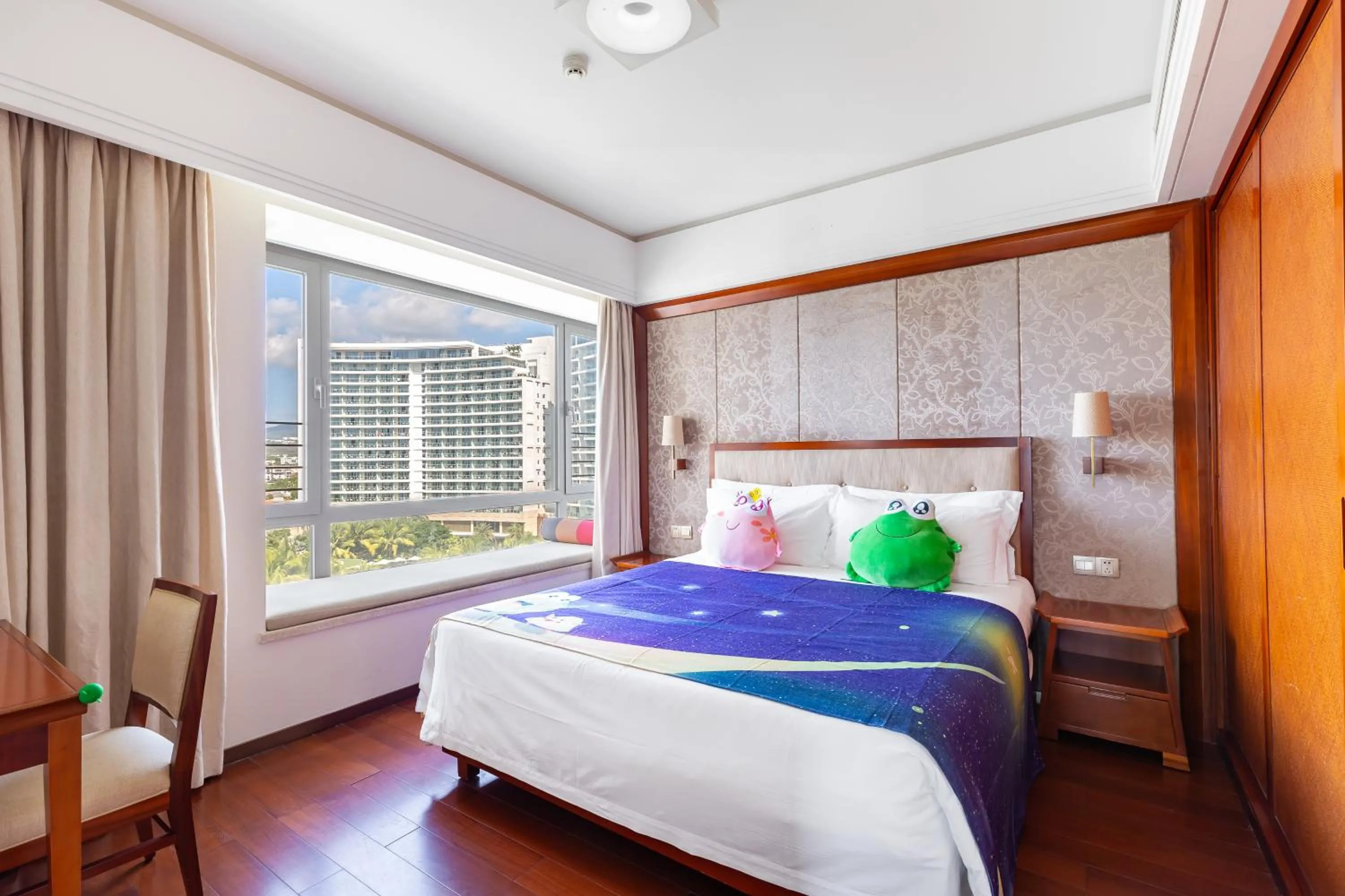 Bed in Sanya Seacube Holiday Hotel