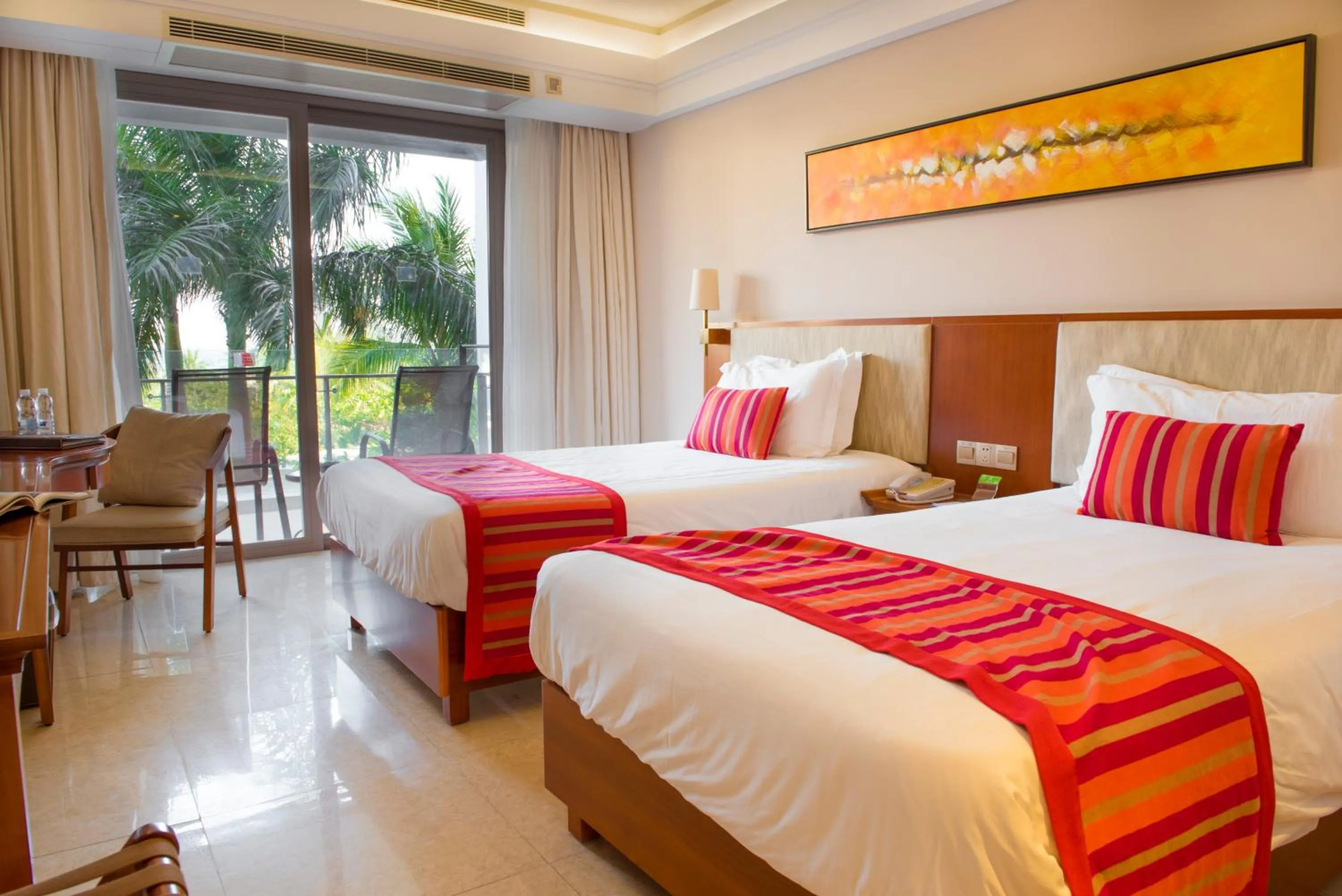 Bed in Sanya Seacube Holiday Hotel
