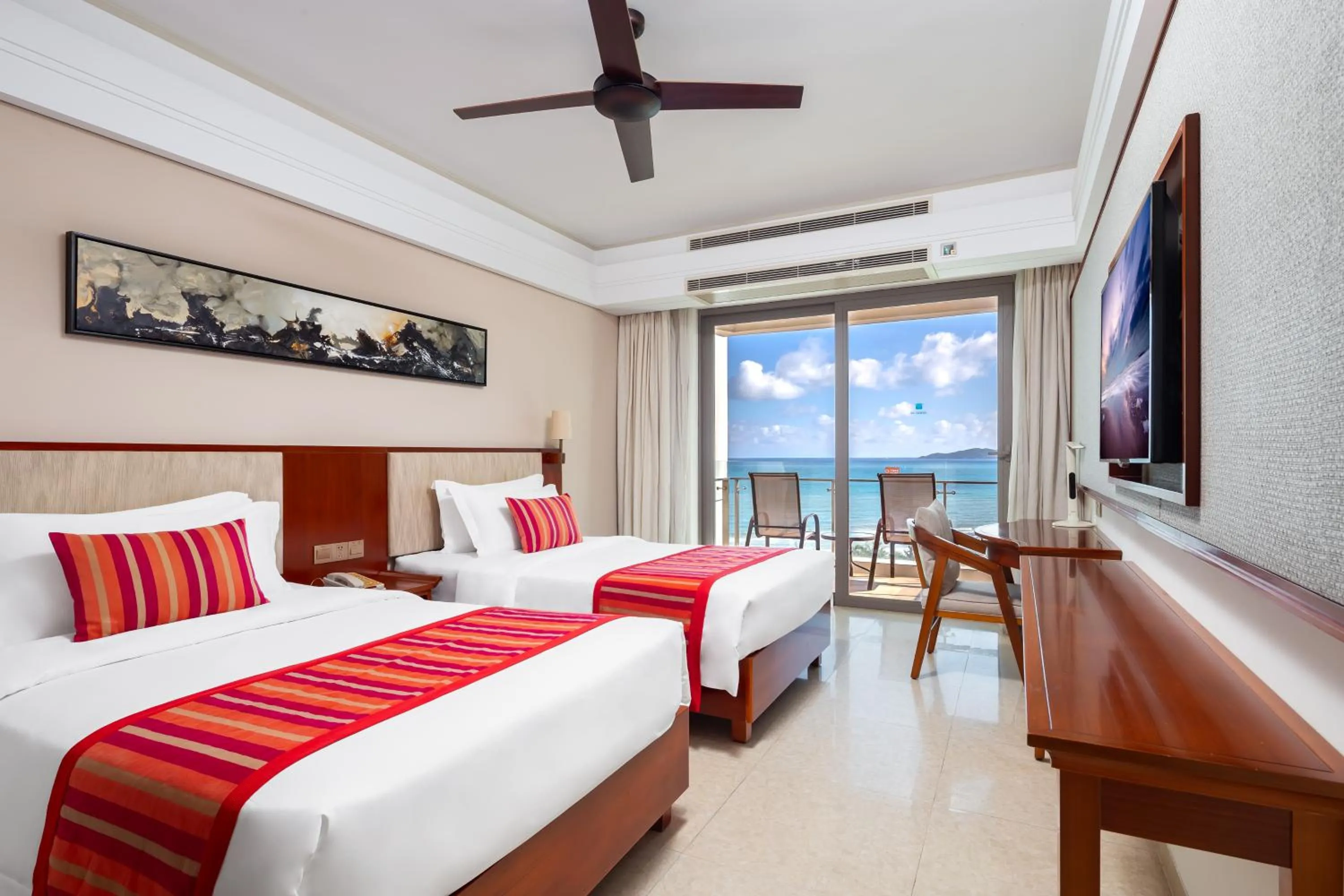 Bed in Sanya Seacube Holiday Hotel