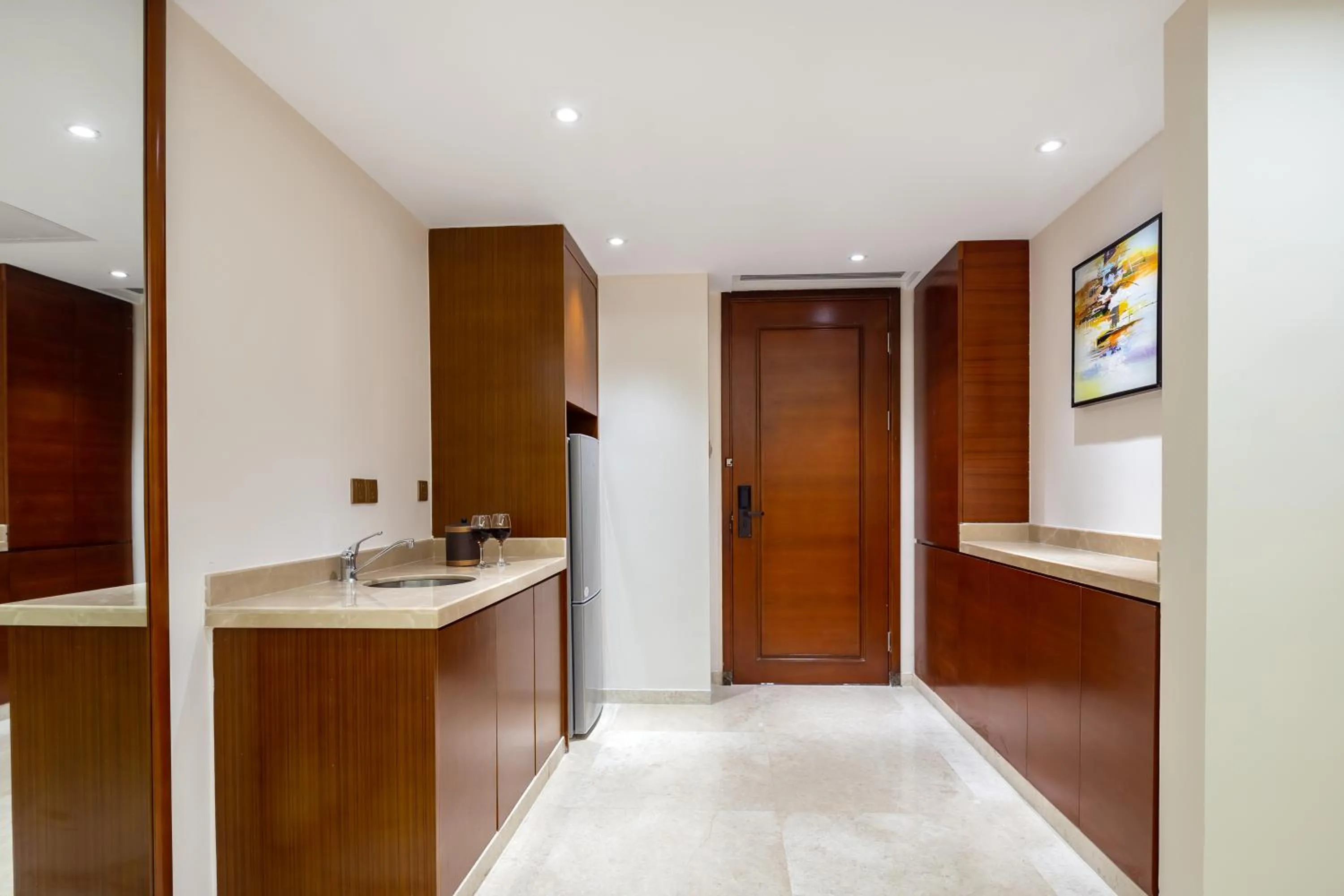 Kitchen or kitchenette in Sanya Seacube Holiday Hotel