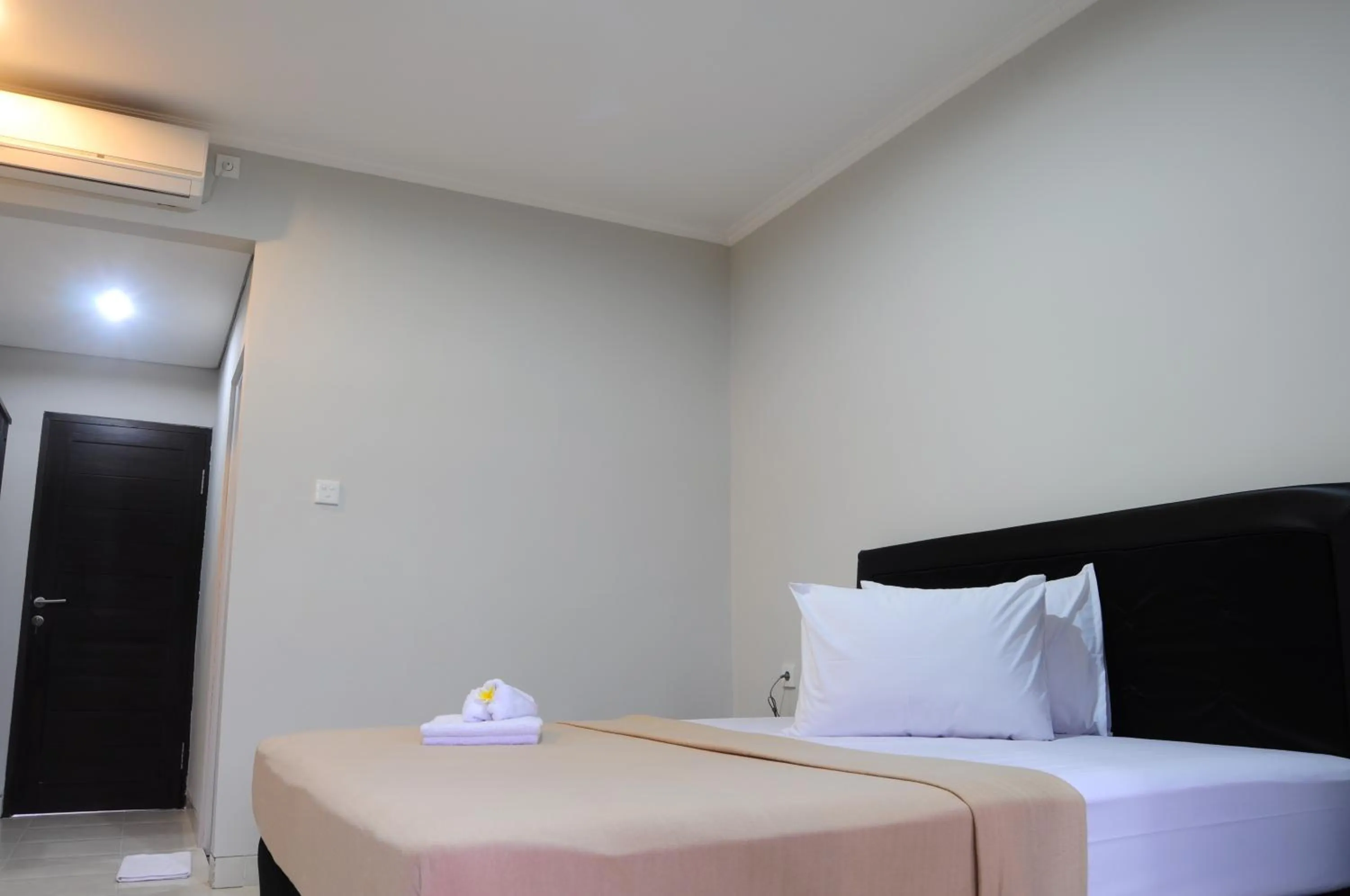 Bed in Amerta Home Stay Bali