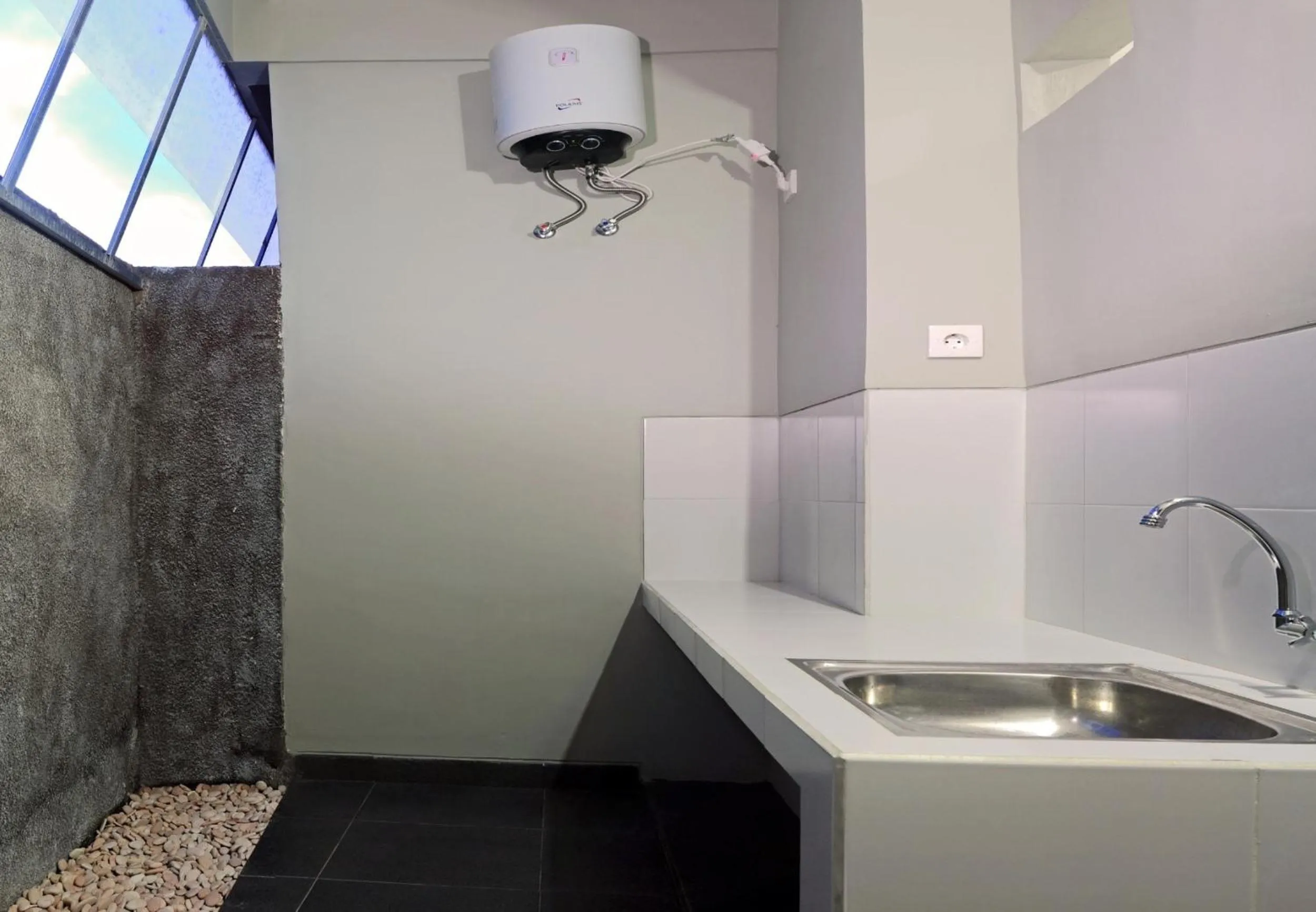 Kitchen or kitchenette in Amerta Home Stay Bali