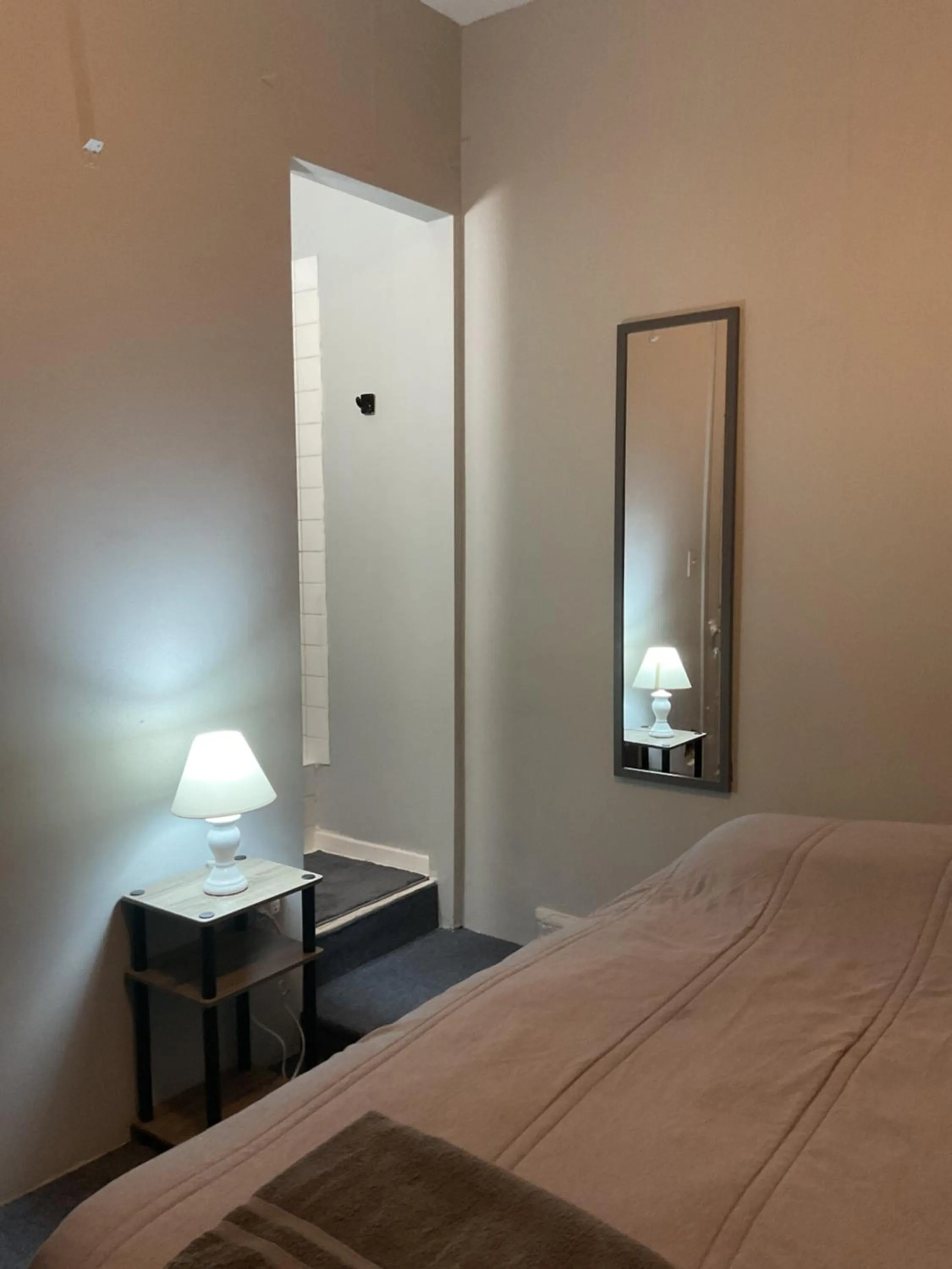 Bed in Macaw Guest House