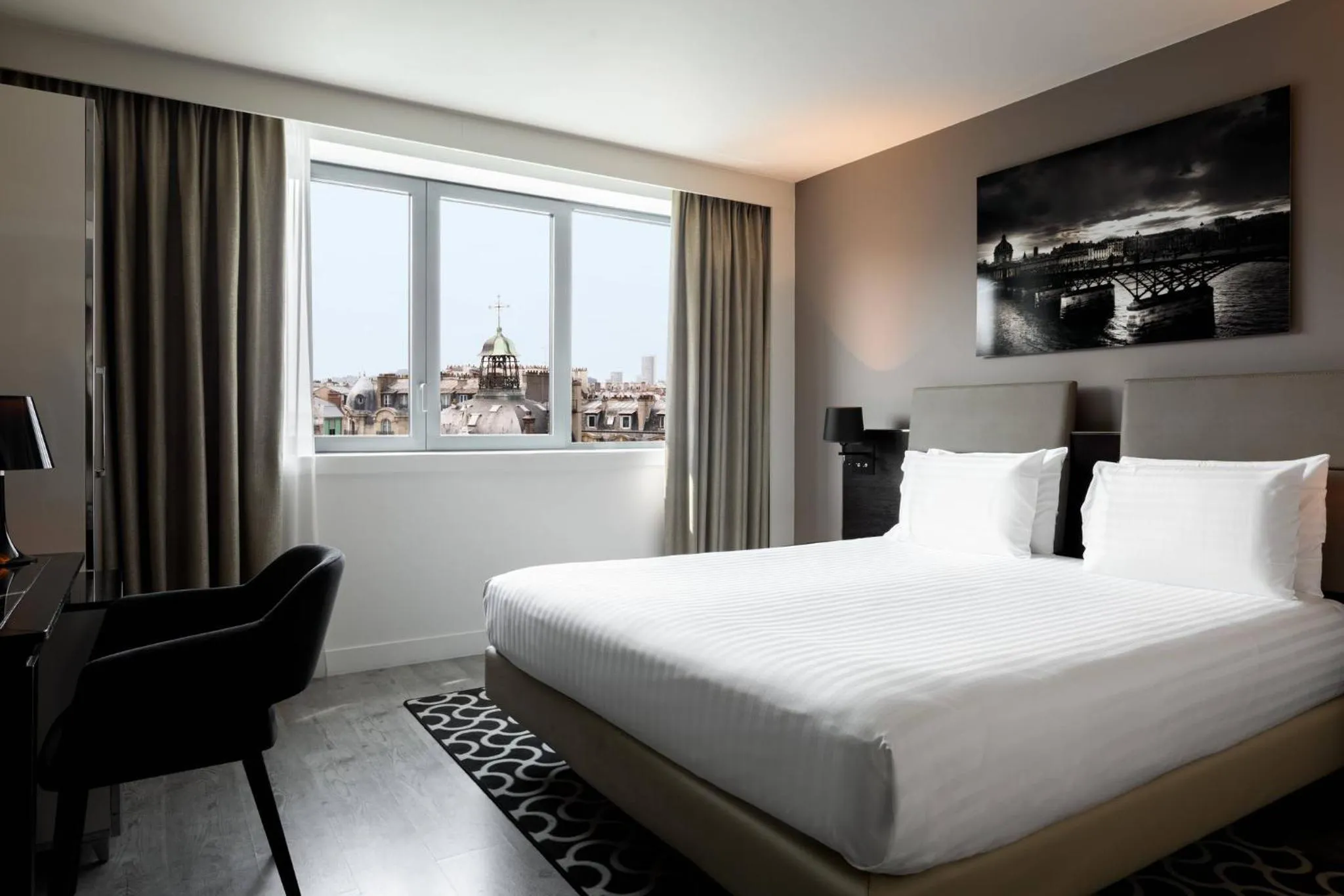 Photo of the whole room, Bed in AC Hotel Paris Porte Maillot by Marriott