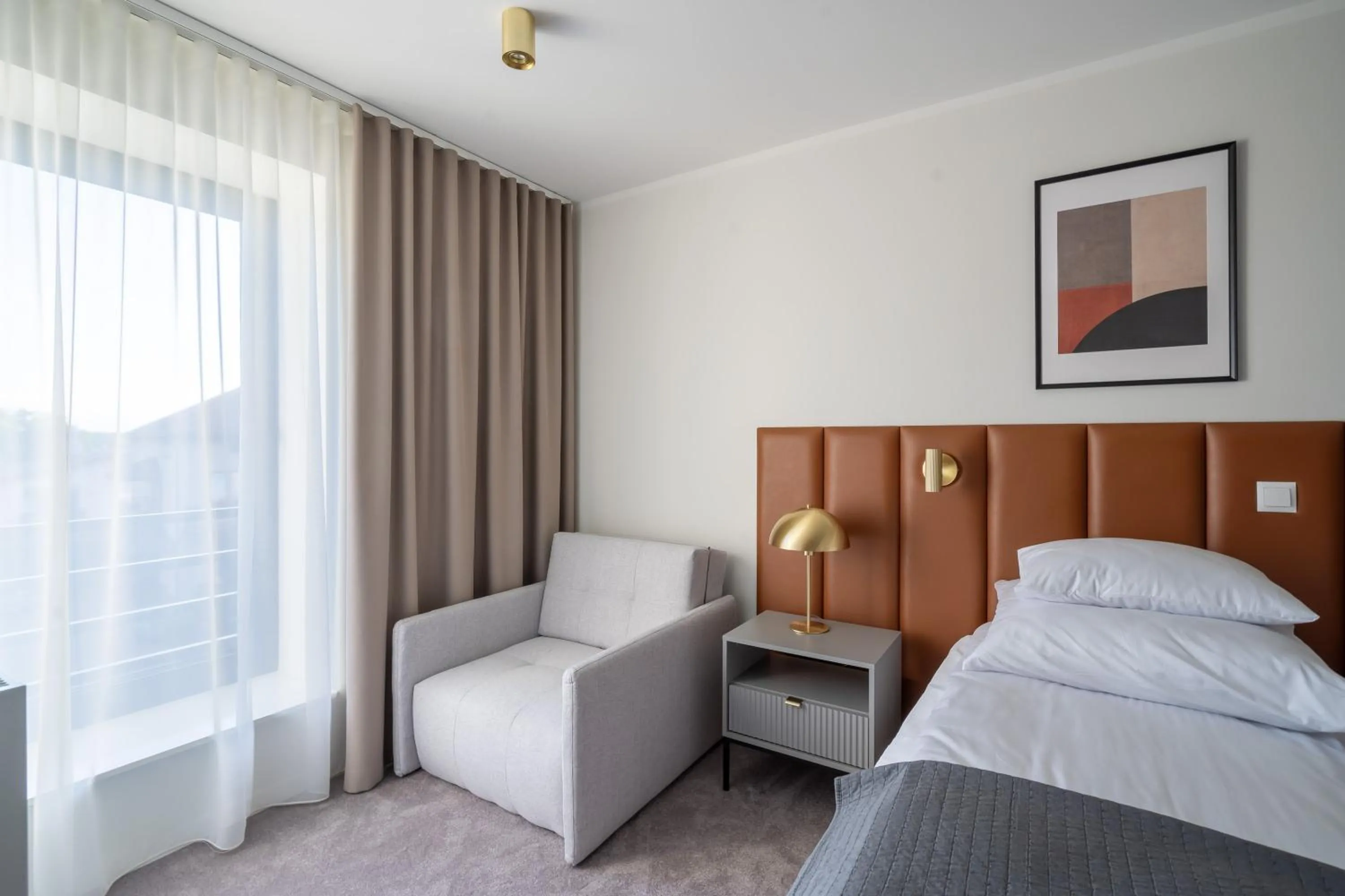 Bed in APARTHOTEL KLEOSIN