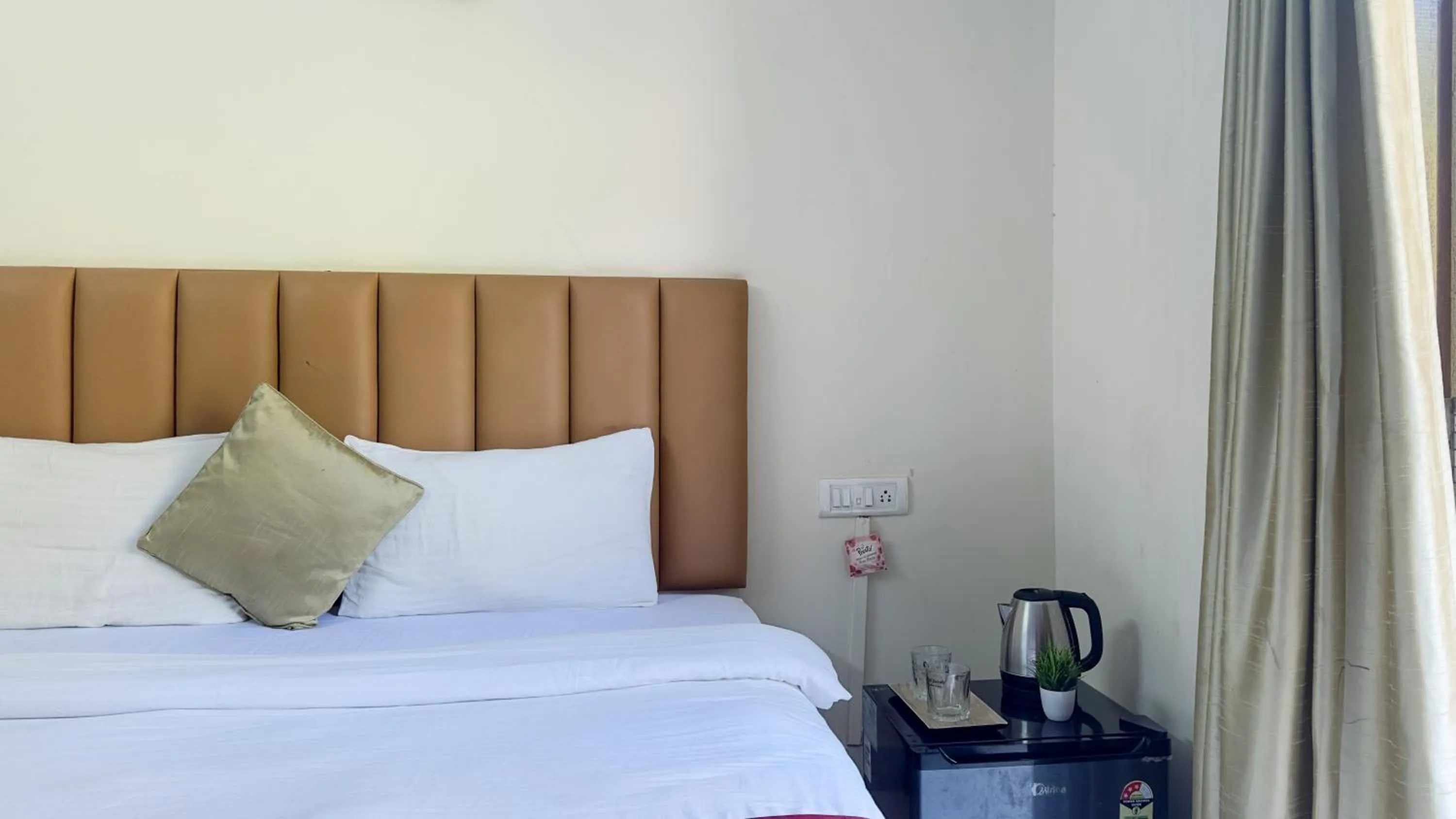 Bed in Hotel Leela Inn Candolim