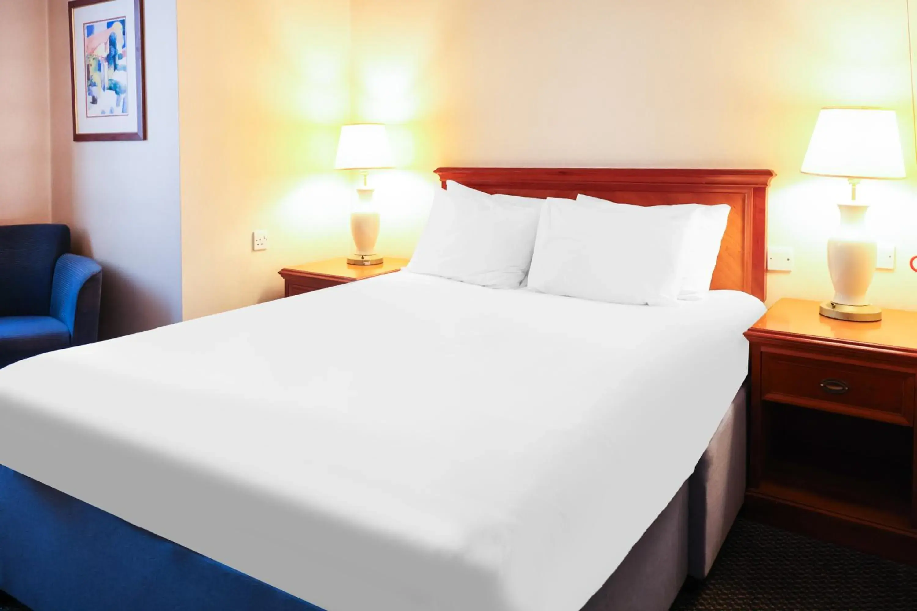 Bed in OYO Tong Park Hotel Bed in OYO Tong Park Hotel