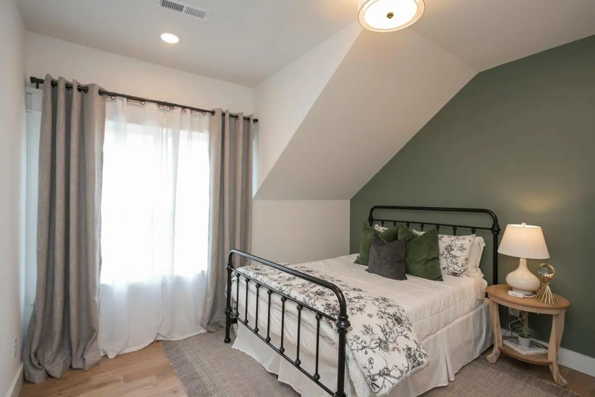 Bed in Custom Home Office Suite Game Room & Fire pit