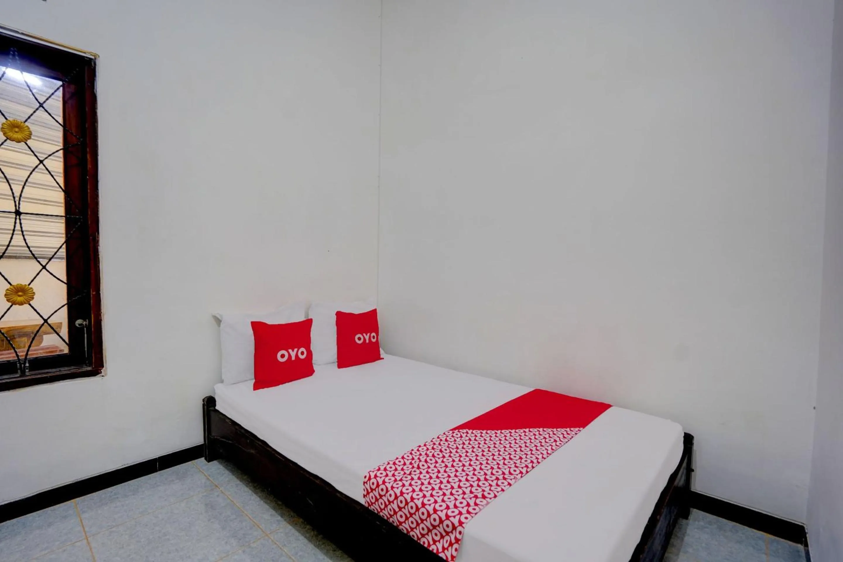 Bedroom in Hotel O Tri D Homestay Syariah