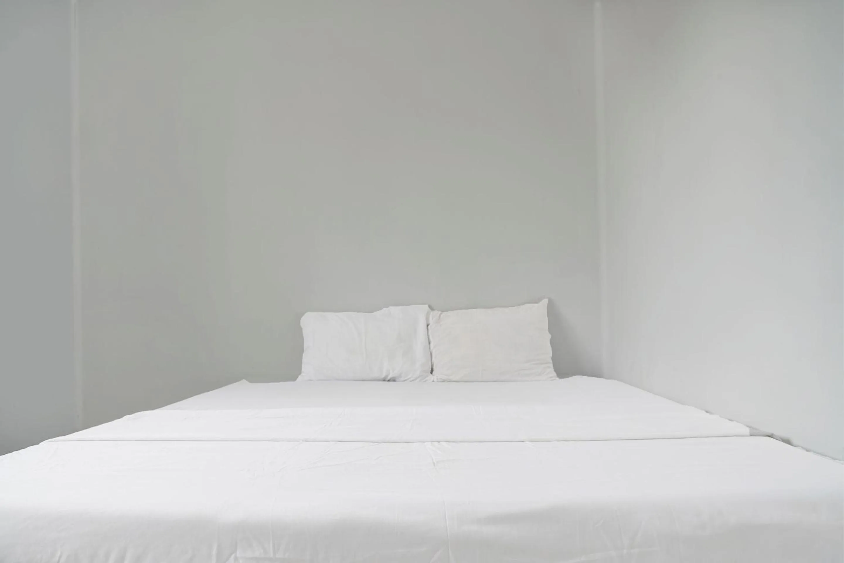 Bedroom in Hotel O Home Stay Syariah Aom Kusman