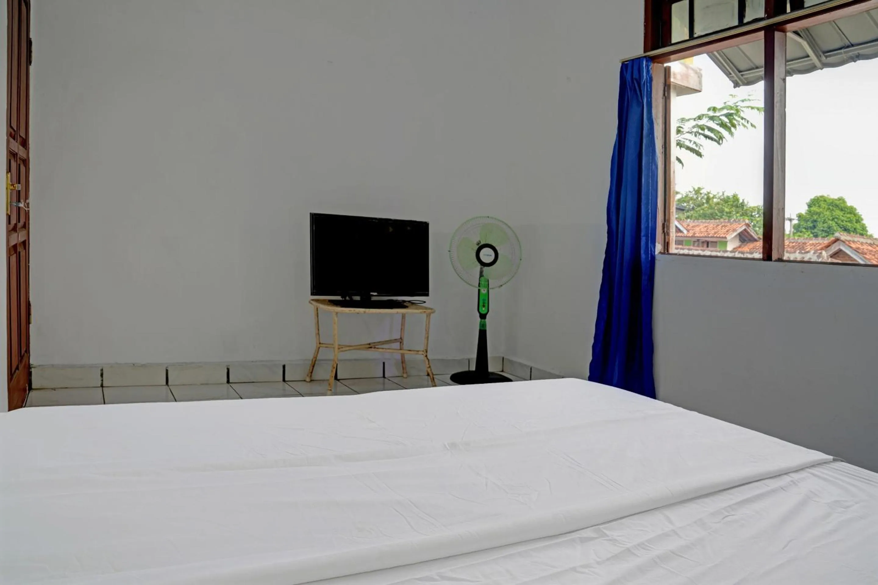 Bedroom in Hotel O Home Stay Syariah Aom Kusman