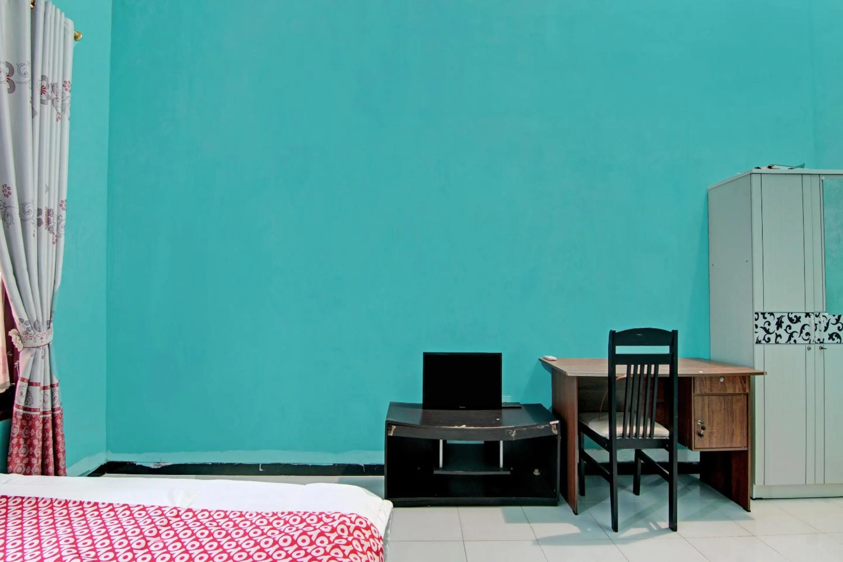 Bedroom in Hotel O Swakarya Guest House