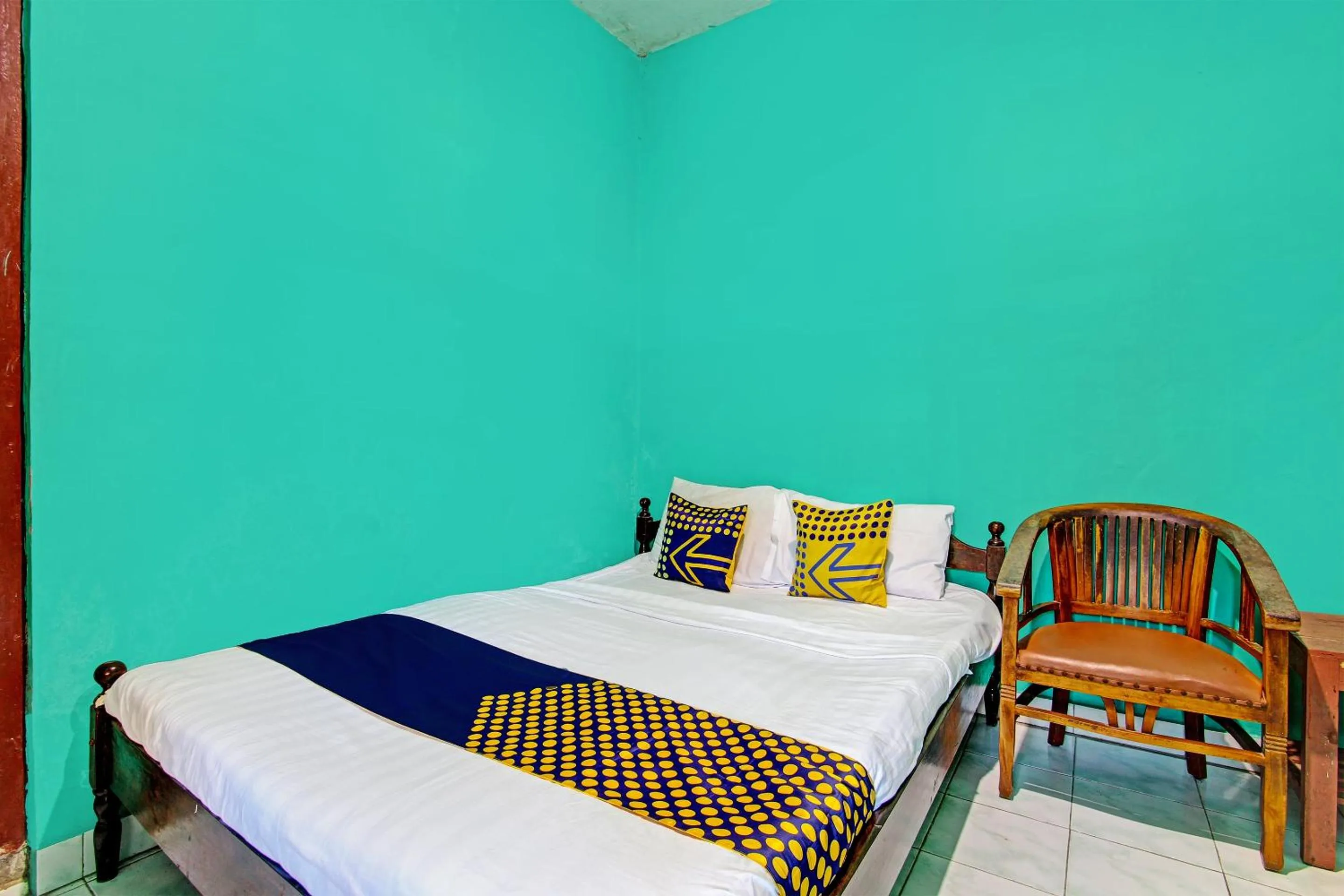 Bedroom in SPOT ON 92873 Losmen Parikesit