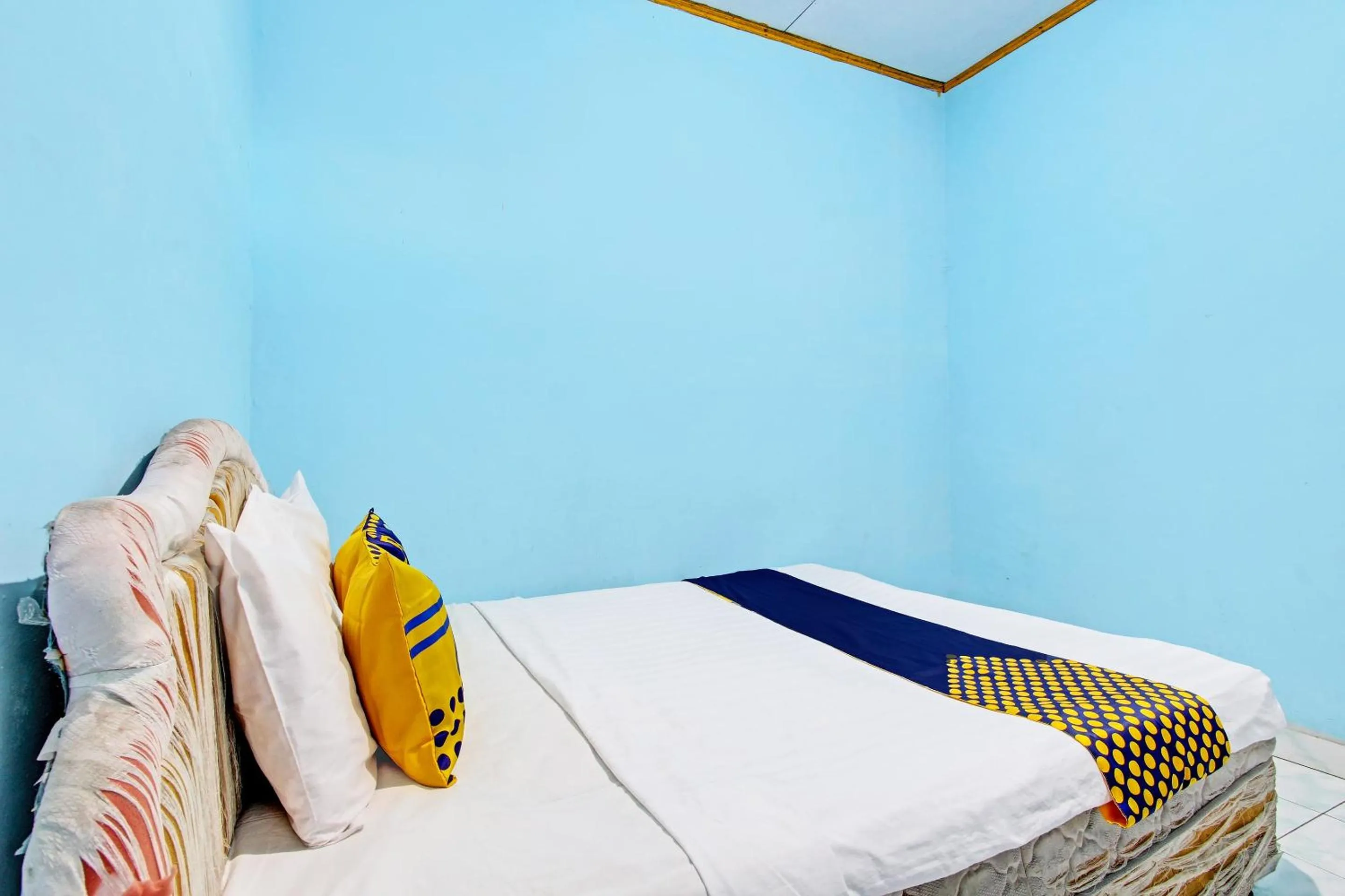 Bedroom in SPOT ON 92873 Losmen Parikesit