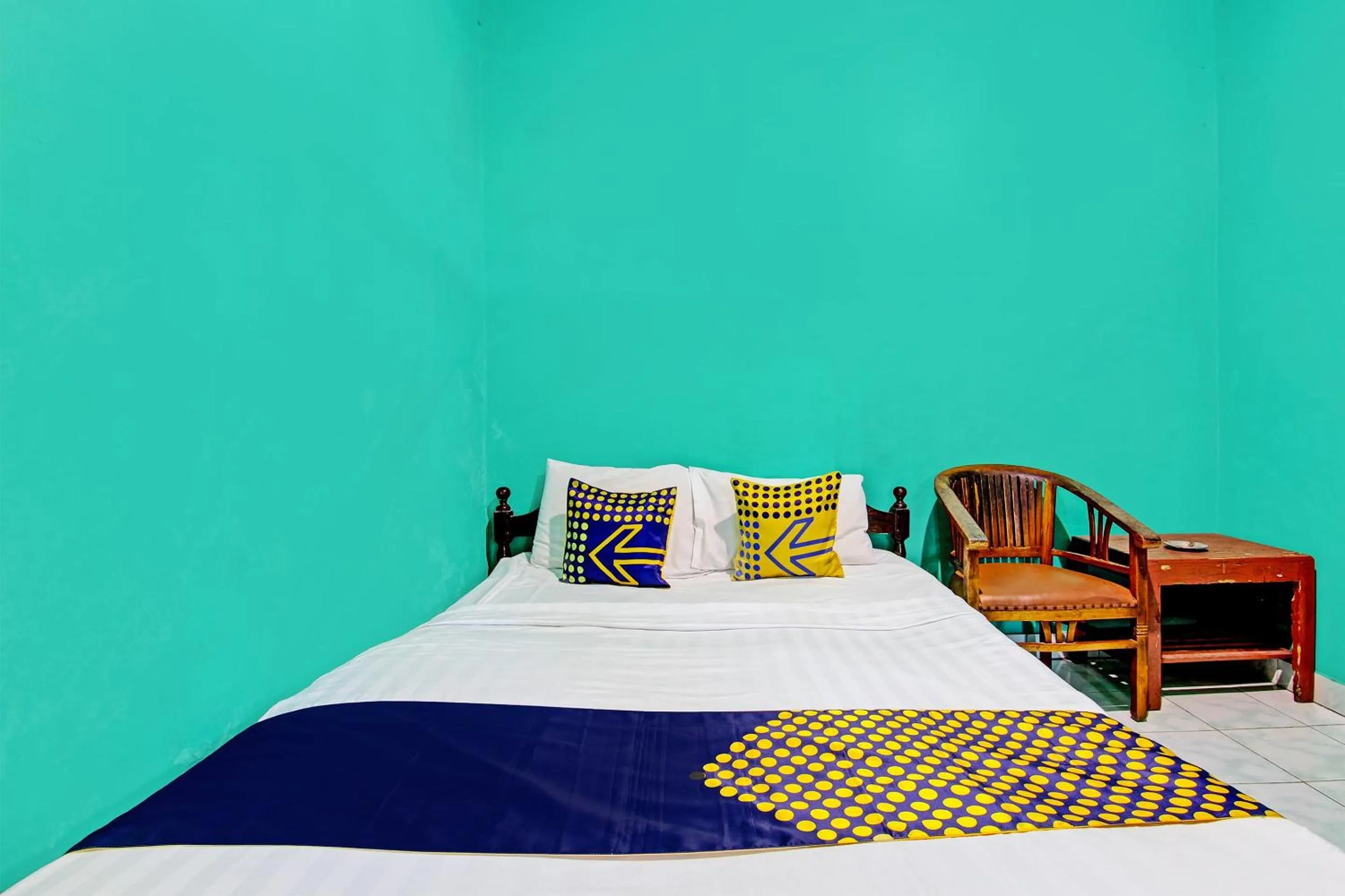 Bedroom in SPOT ON 92873 Losmen Parikesit