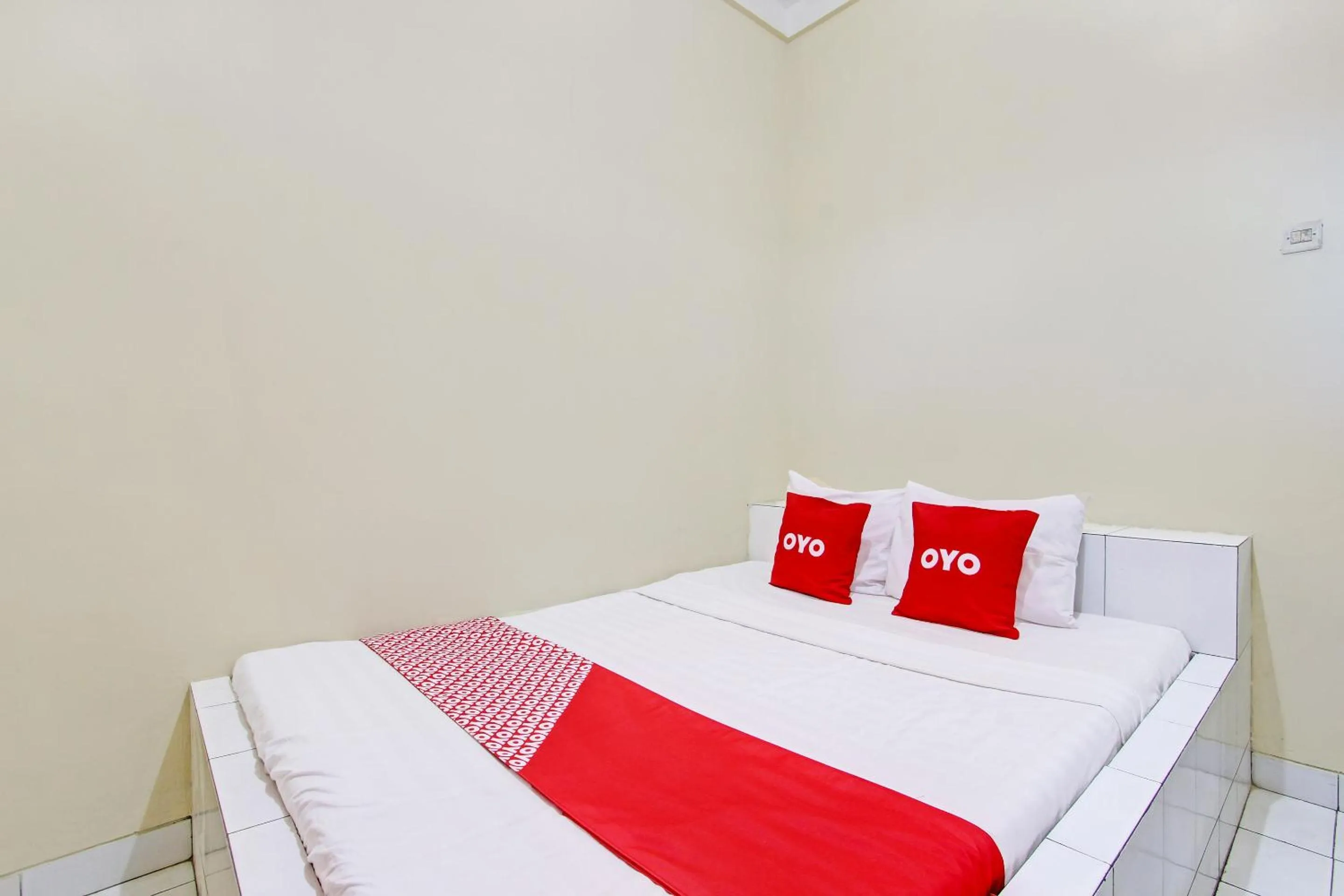 Bedroom in OYO 92884 Agustha Homestay