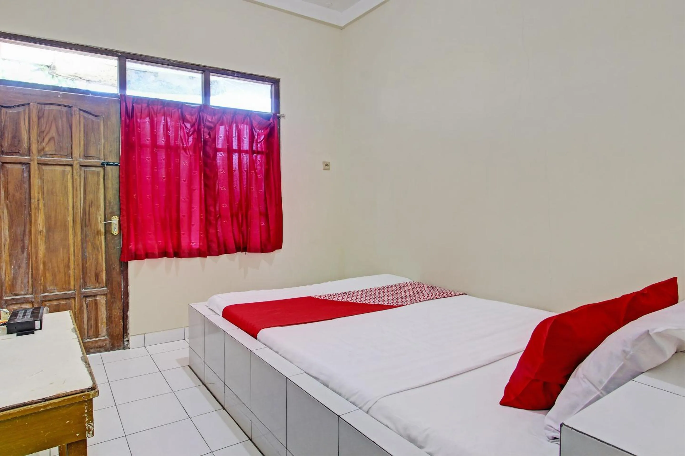 Bedroom in OYO 92884 Agustha Homestay