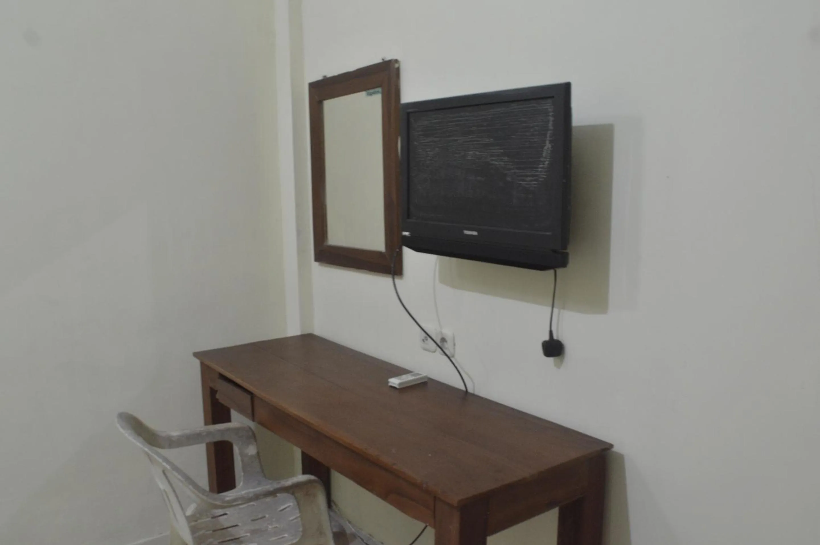 Bedroom in OYO 92880 Wisma Nusantara