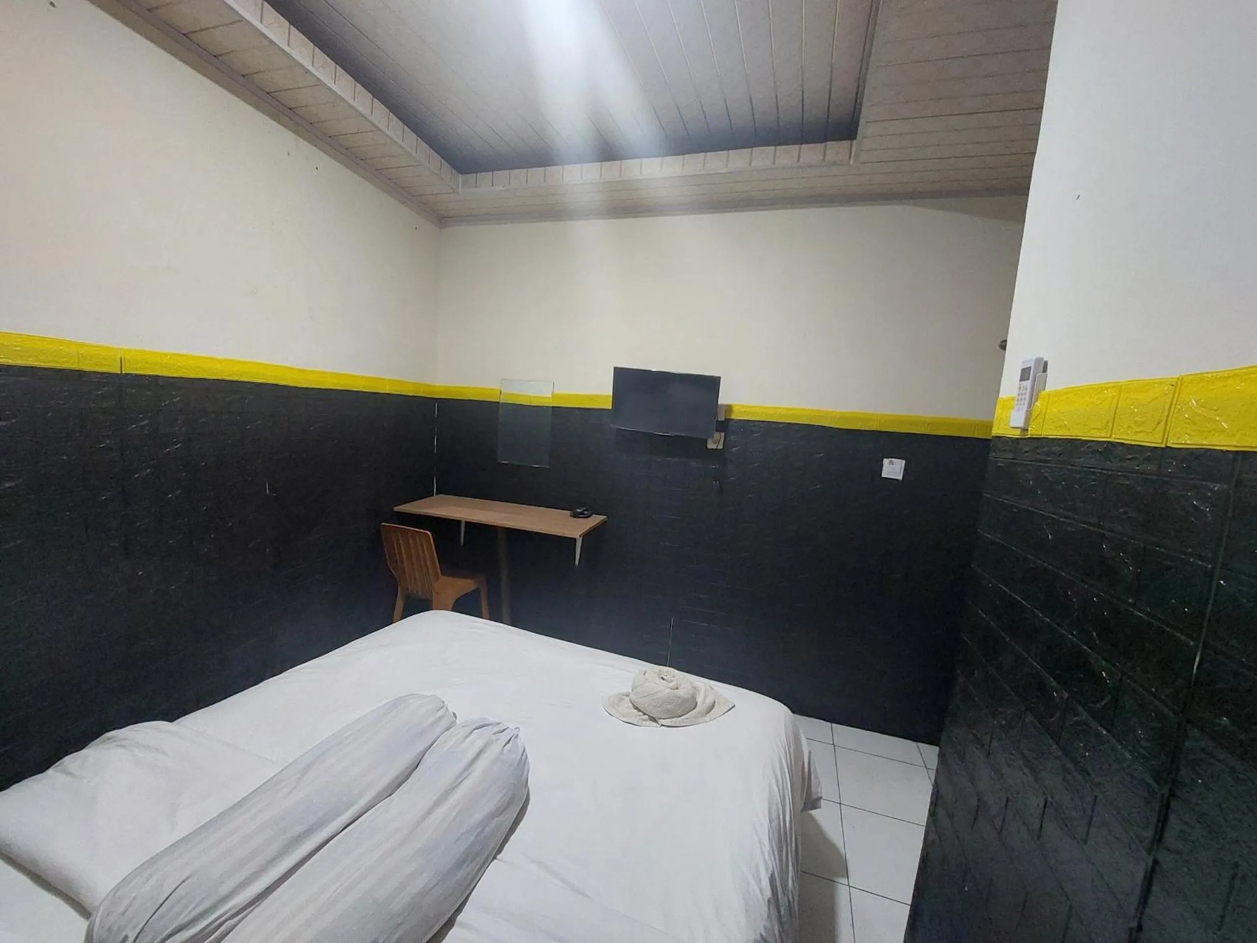 Bedroom, Bed in Hotel O Mahendra HomestayNearTaman Wisata Bukit Rurukan