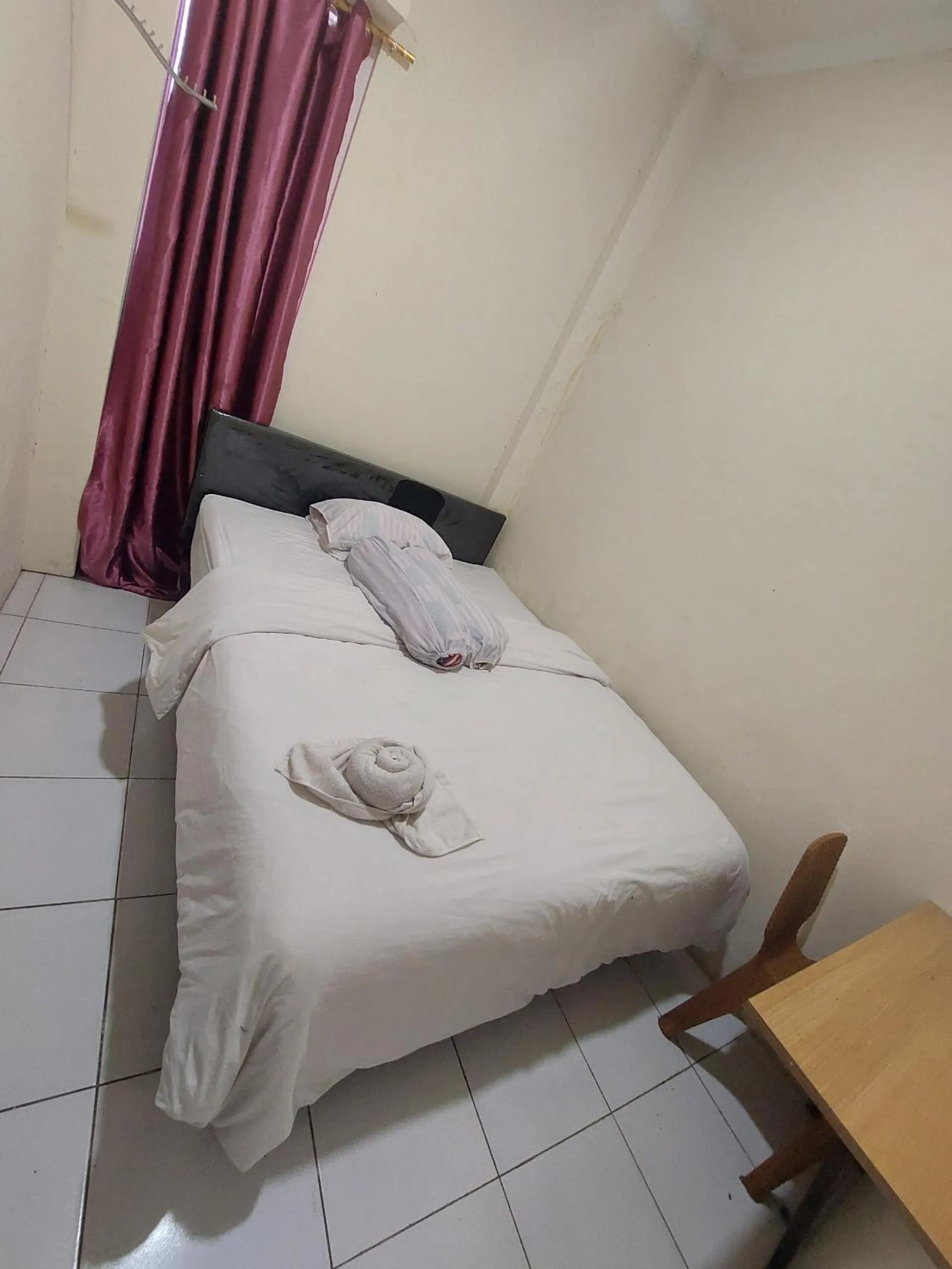 Bedroom, Bed in Hotel O Mahendra HomestayNearTaman Wisata Bukit Rurukan