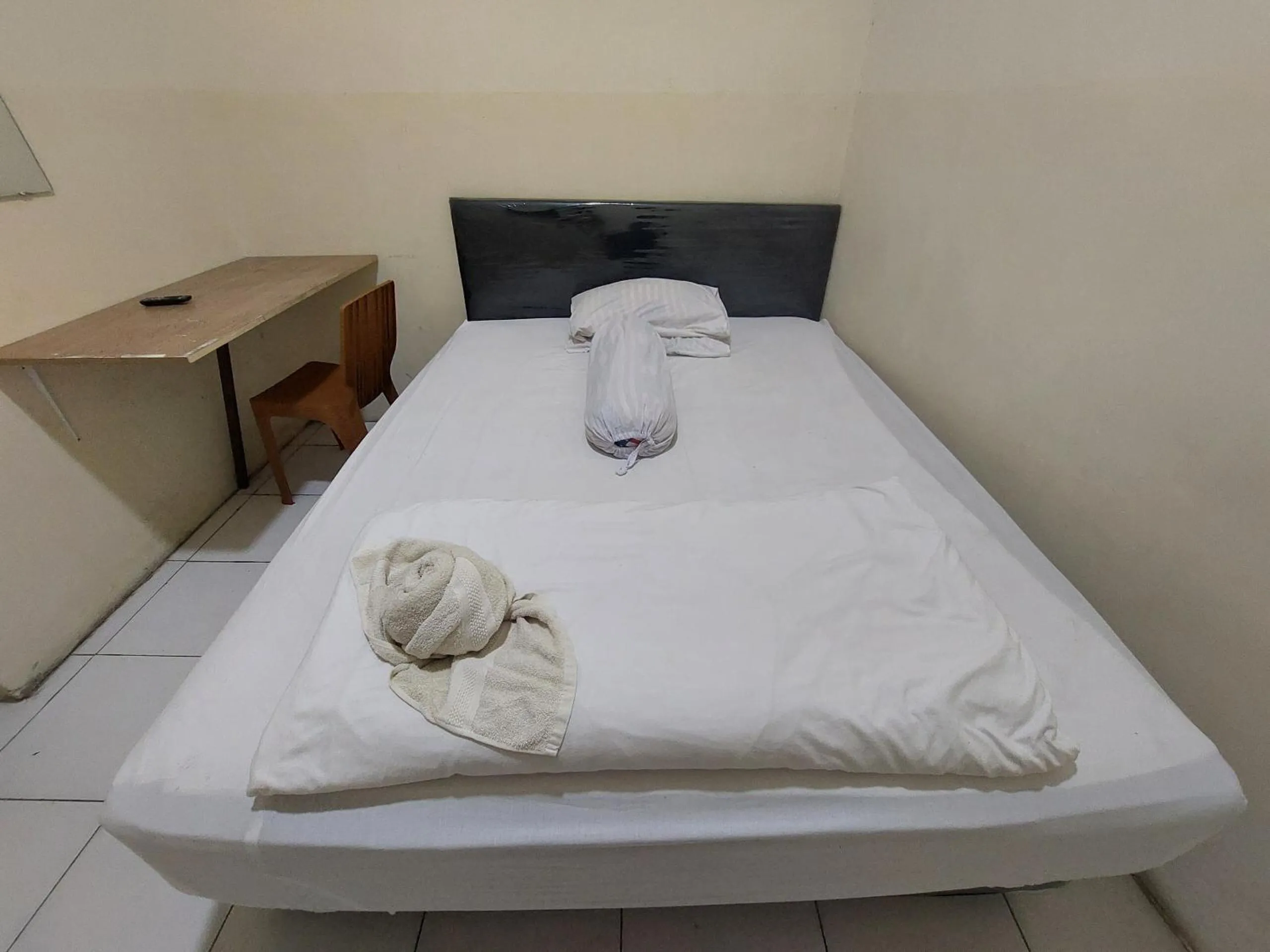 Bedroom, Bed in Hotel O Mahendra HomestayNearTaman Wisata Bukit Rurukan