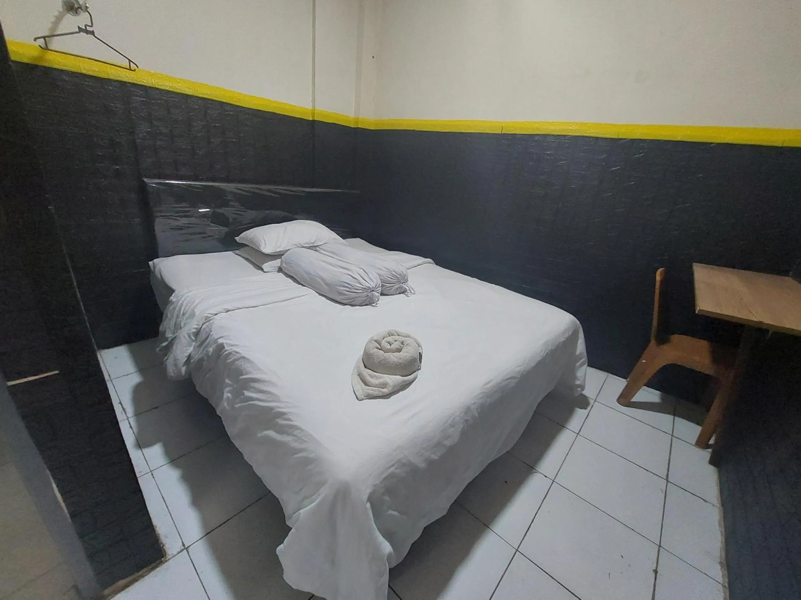 Bedroom, Bed in Hotel O Mahendra HomestayNearTaman Wisata Bukit Rurukan