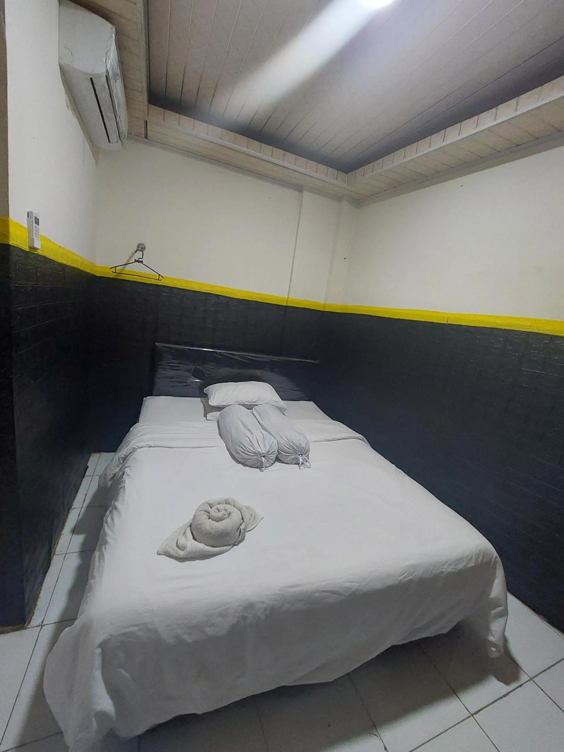 Bedroom, Bed in Hotel O Mahendra HomestayNearTaman Wisata Bukit Rurukan