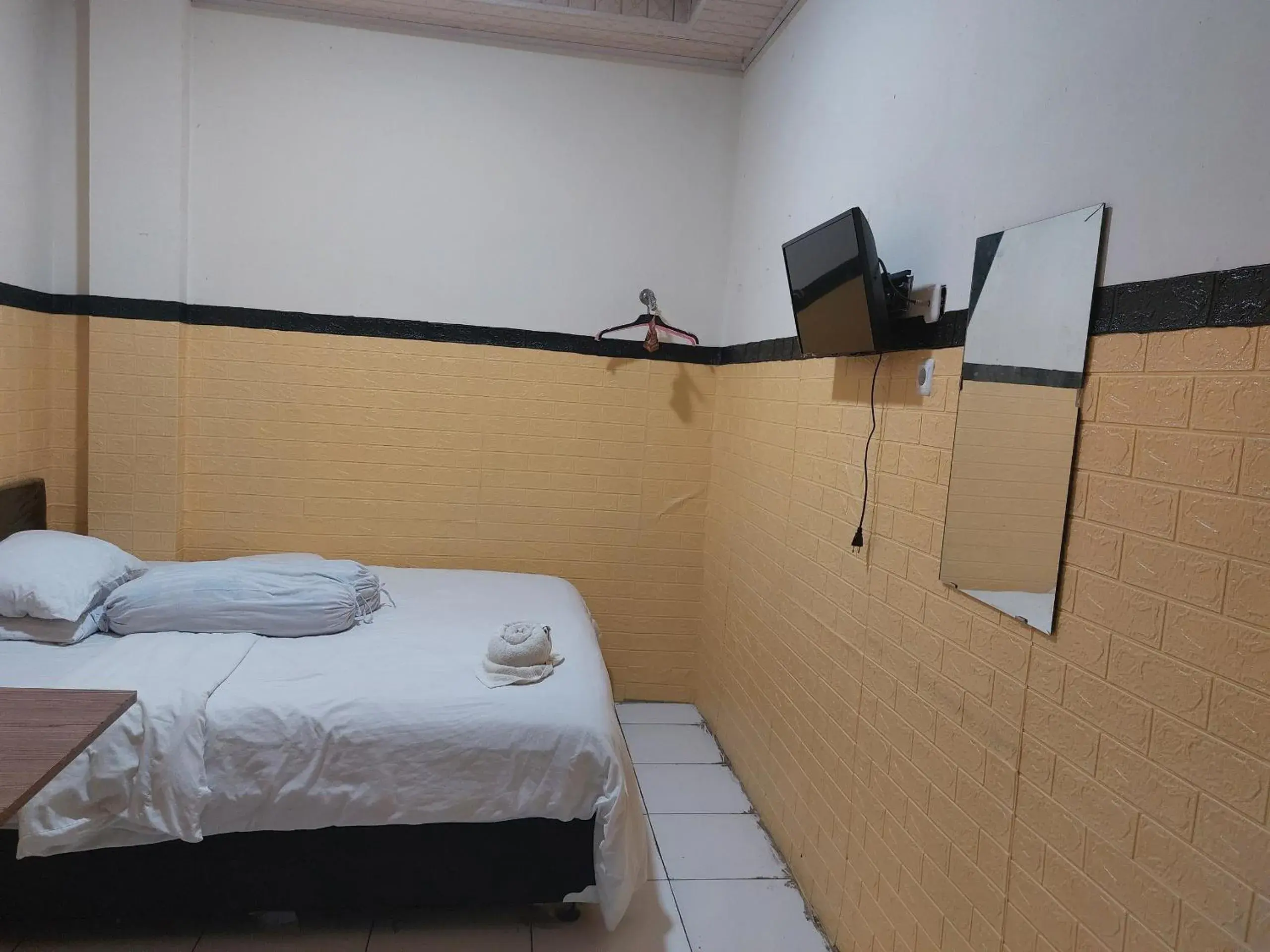 Bedroom, Bed in Hotel O Mahendra HomestayNearTaman Wisata Bukit Rurukan Bedroom, Bed in Hotel O Mahendra HomestayNearTaman Wisata Bukit Rurukan