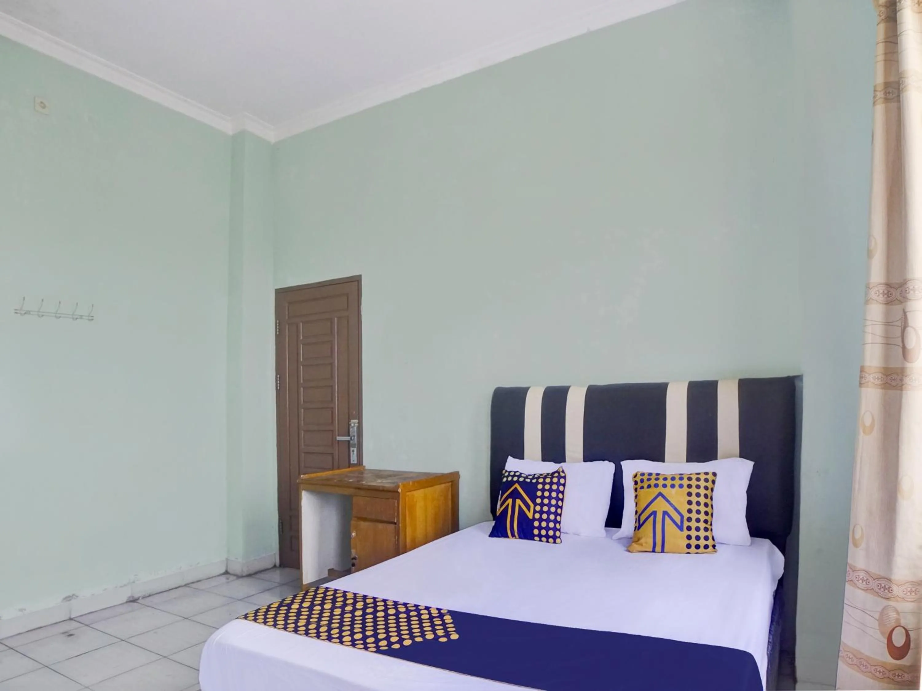 Bedroom, Bed in Hotel O Penginapan Pakam