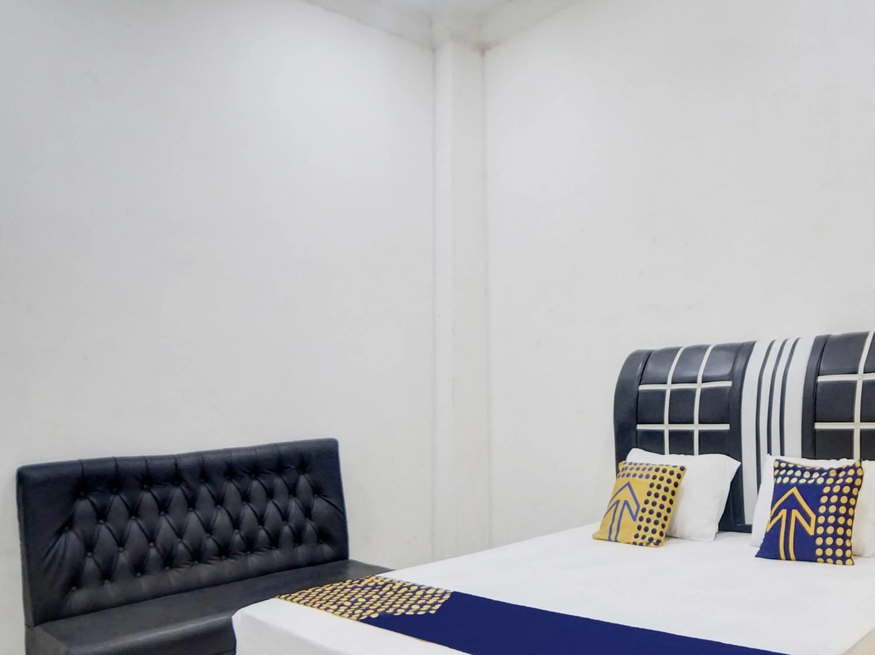 Bedroom, Bed in Hotel O Penginapan Pakam