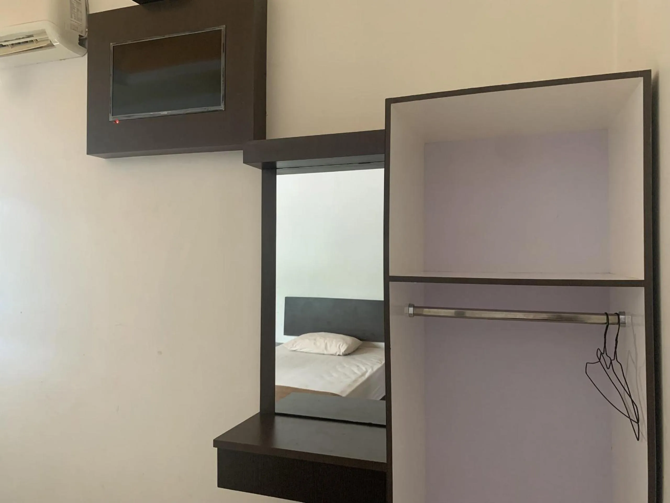 Bedroom in Hotel O Penginapan Laota Syariah Near Rumah Sakit Islam Faisal Makassar