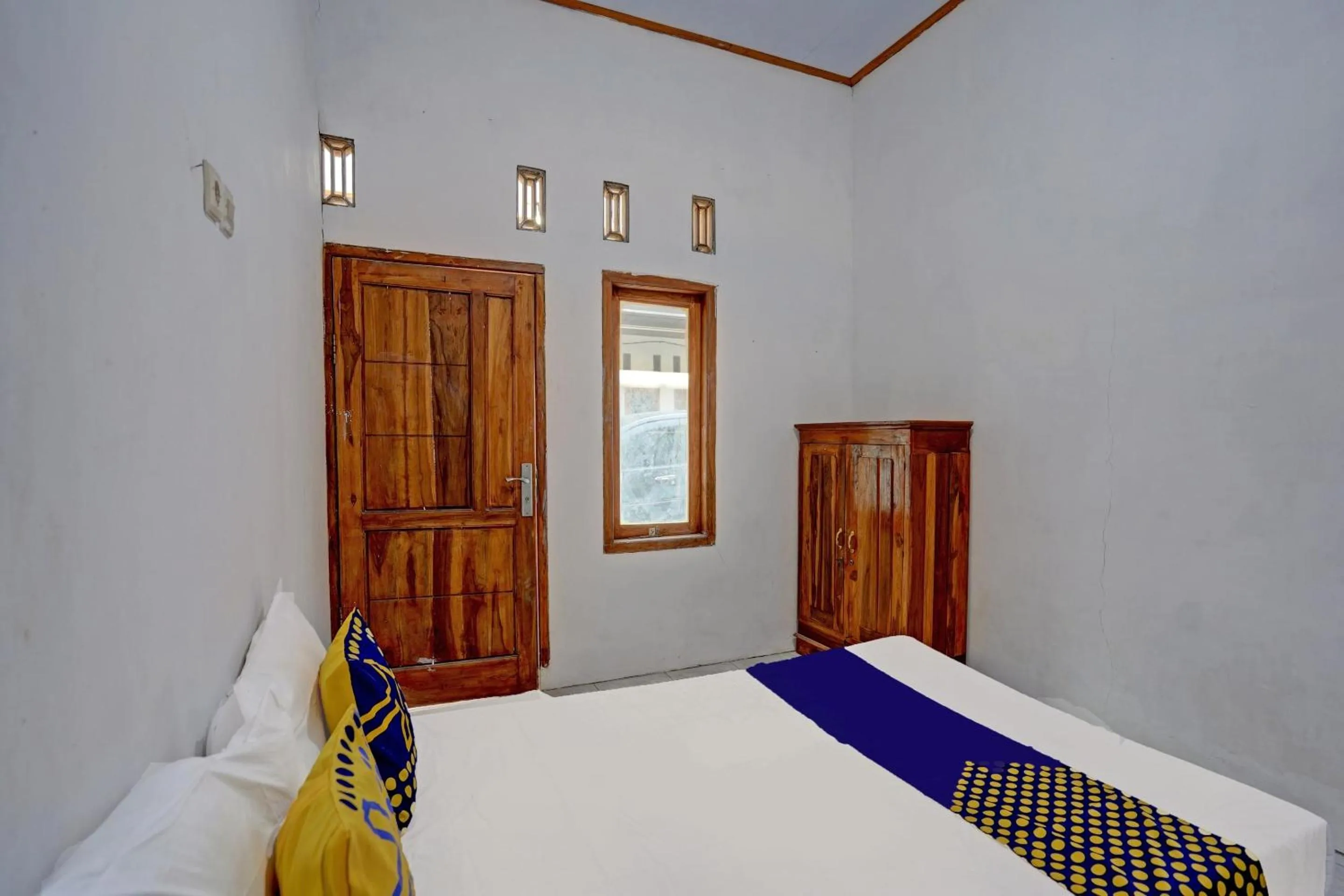 Bedroom, Bed in Hotel O Surya Indah Homestay Syariah