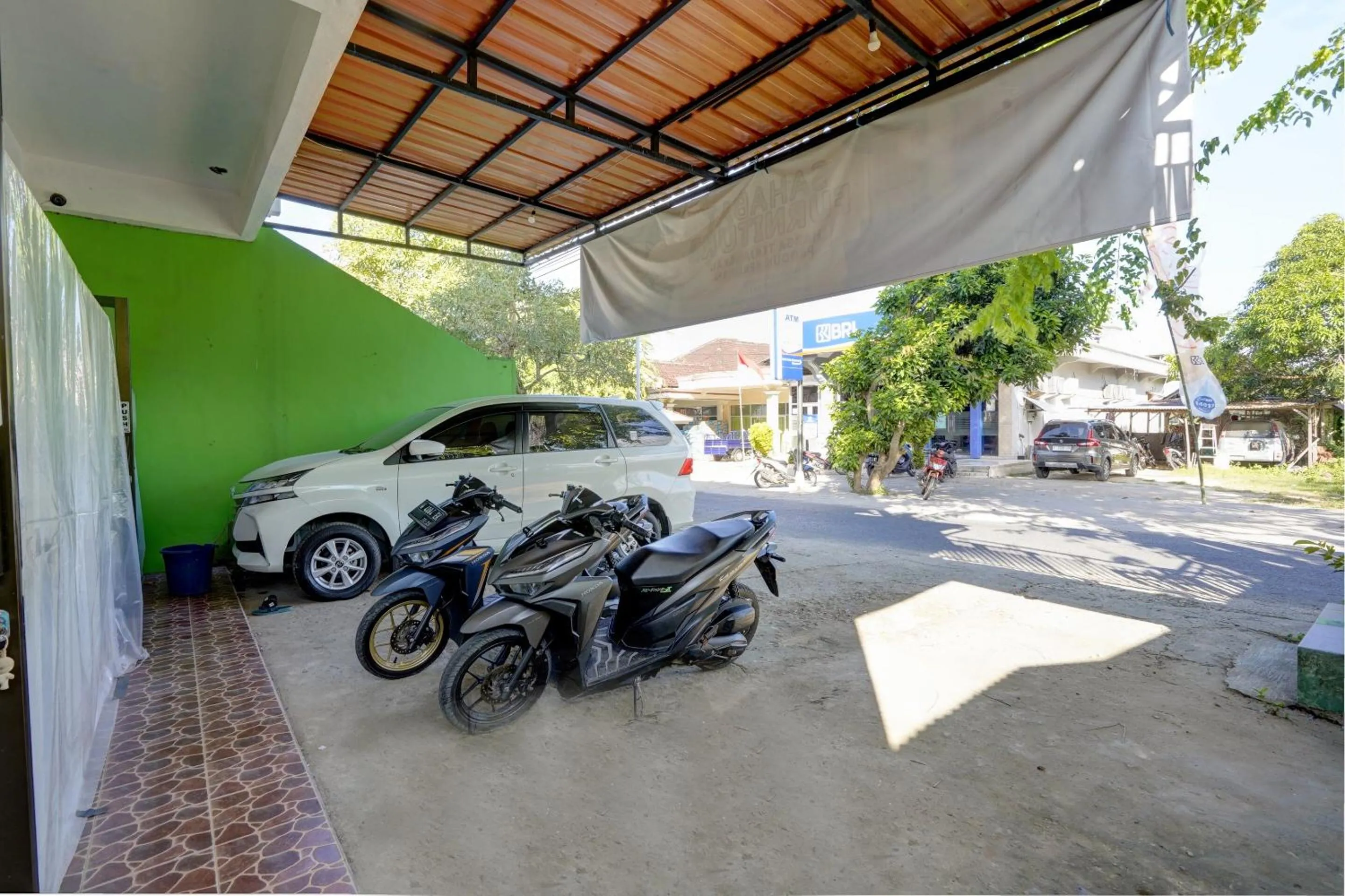 Facade/entrance in Hotel O Sahabat Syariah Near Plasa Telkom Bawean