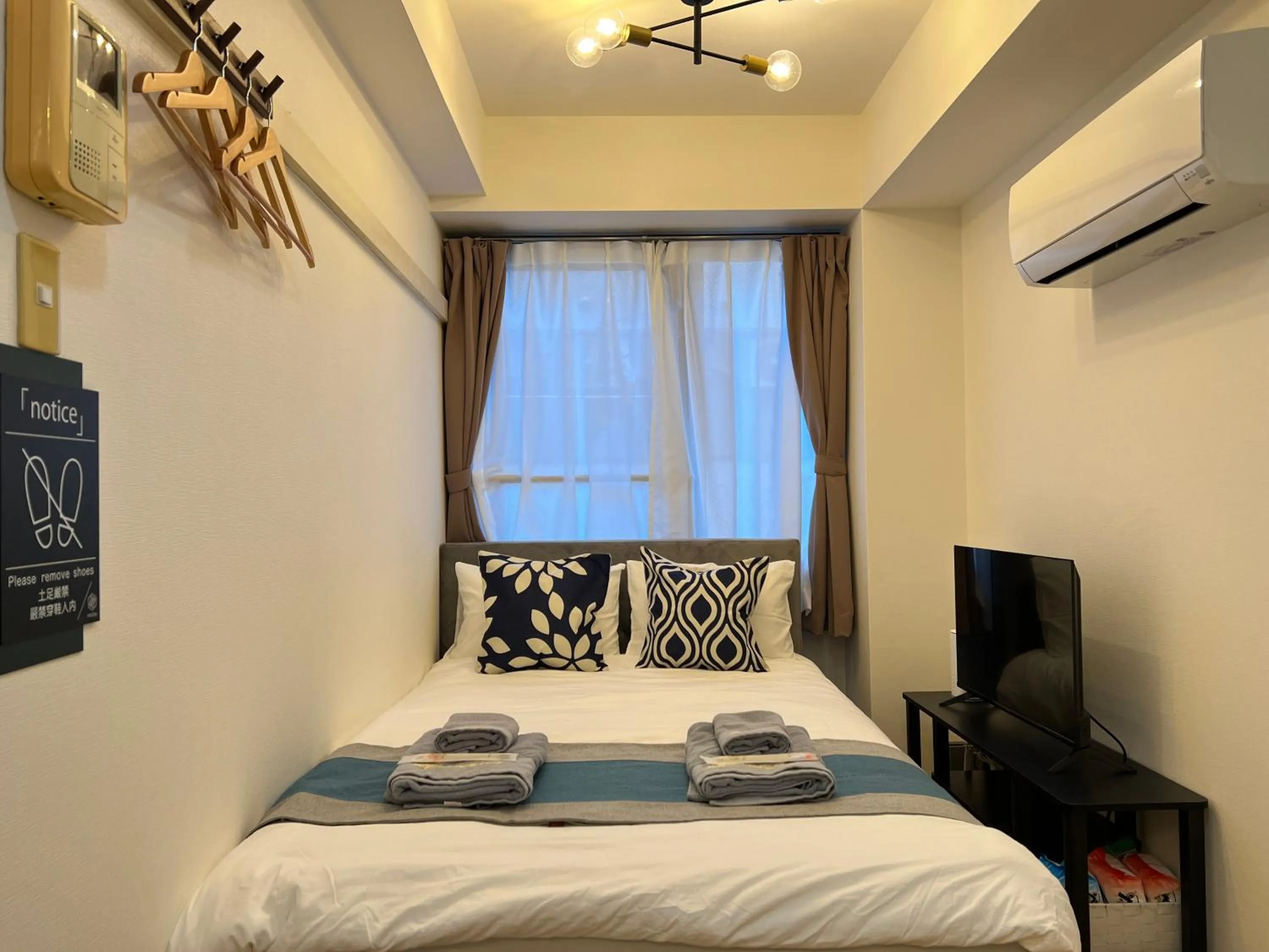 Bed in nestay apartment tokyo itabashi