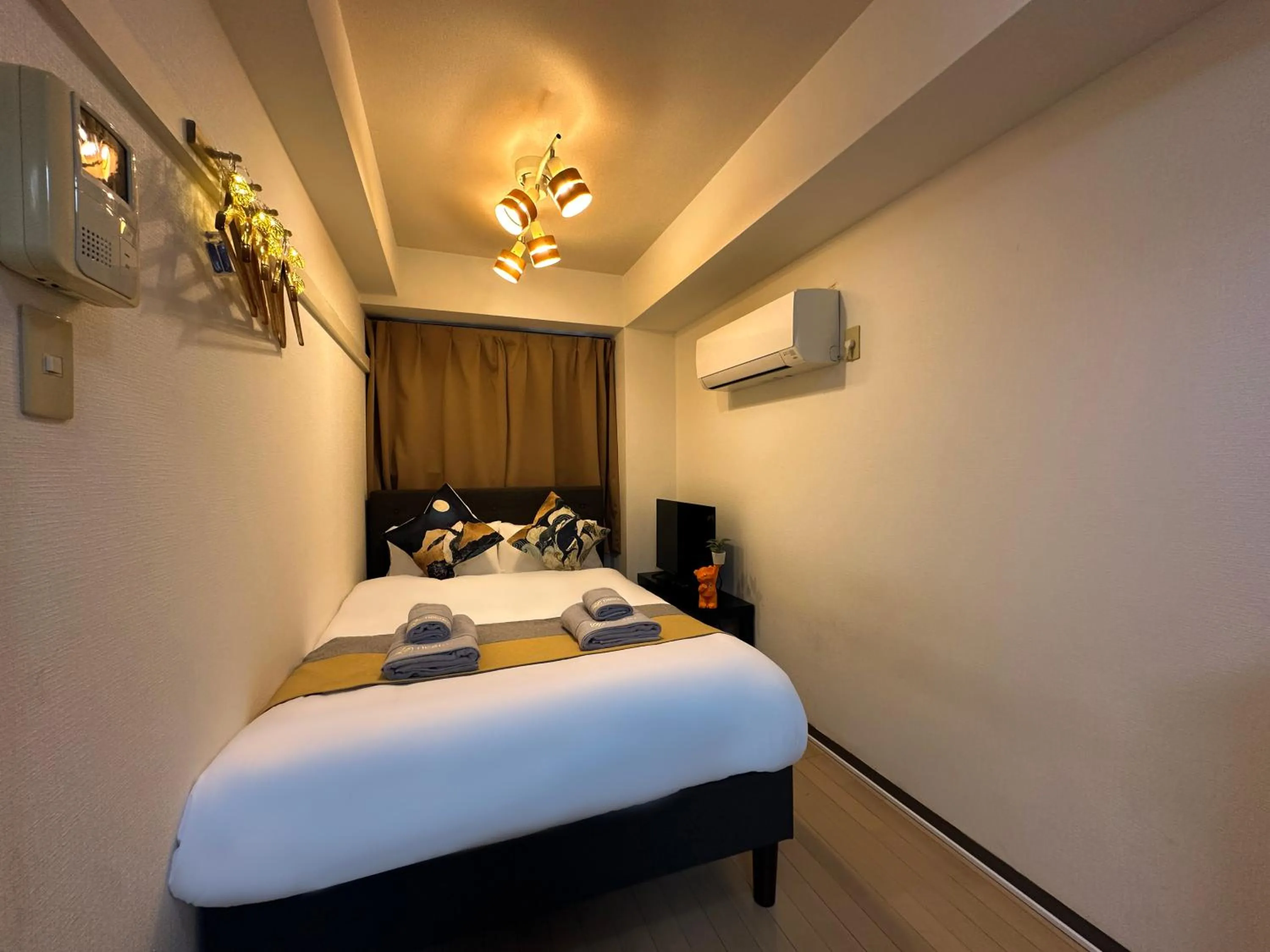 Bed in nestay apartment tokyo itabashi