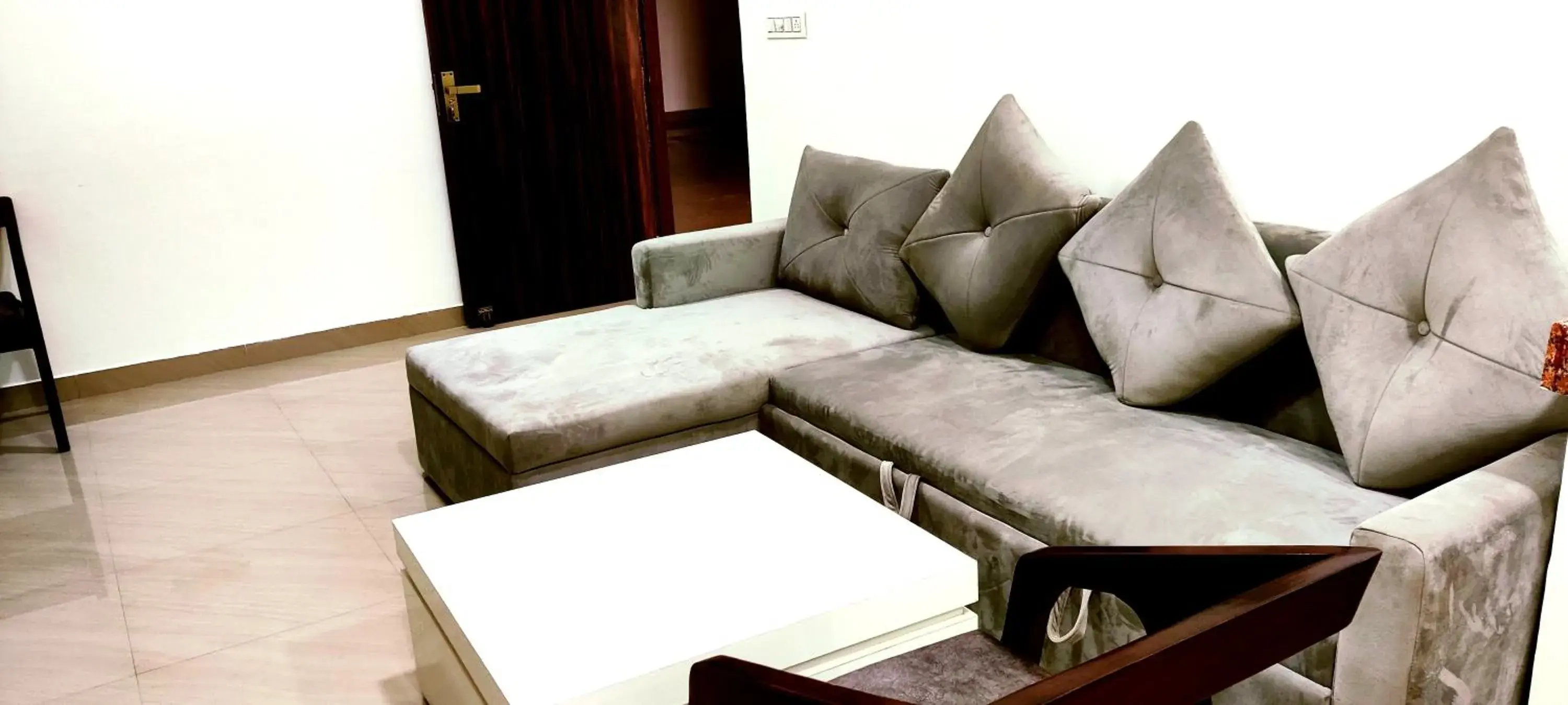 Living room in The Grand ND Resort- Kanha Tulsi Heights Behind Prem Mandir Living room in The Grand ND Resort- Kanha Tulsi Heights Behind Prem Mandir