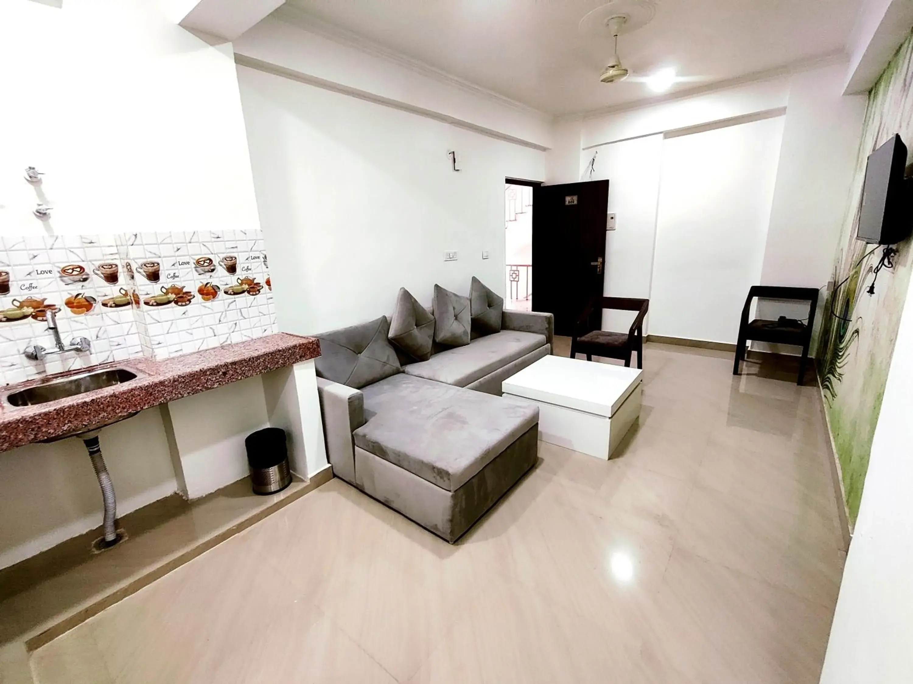 Living room in The Grand ND Resort- Kanha Tulsi Heights Behind Prem Mandir Living room in The Grand ND Resort- Kanha Tulsi Heights Behind Prem Mandir