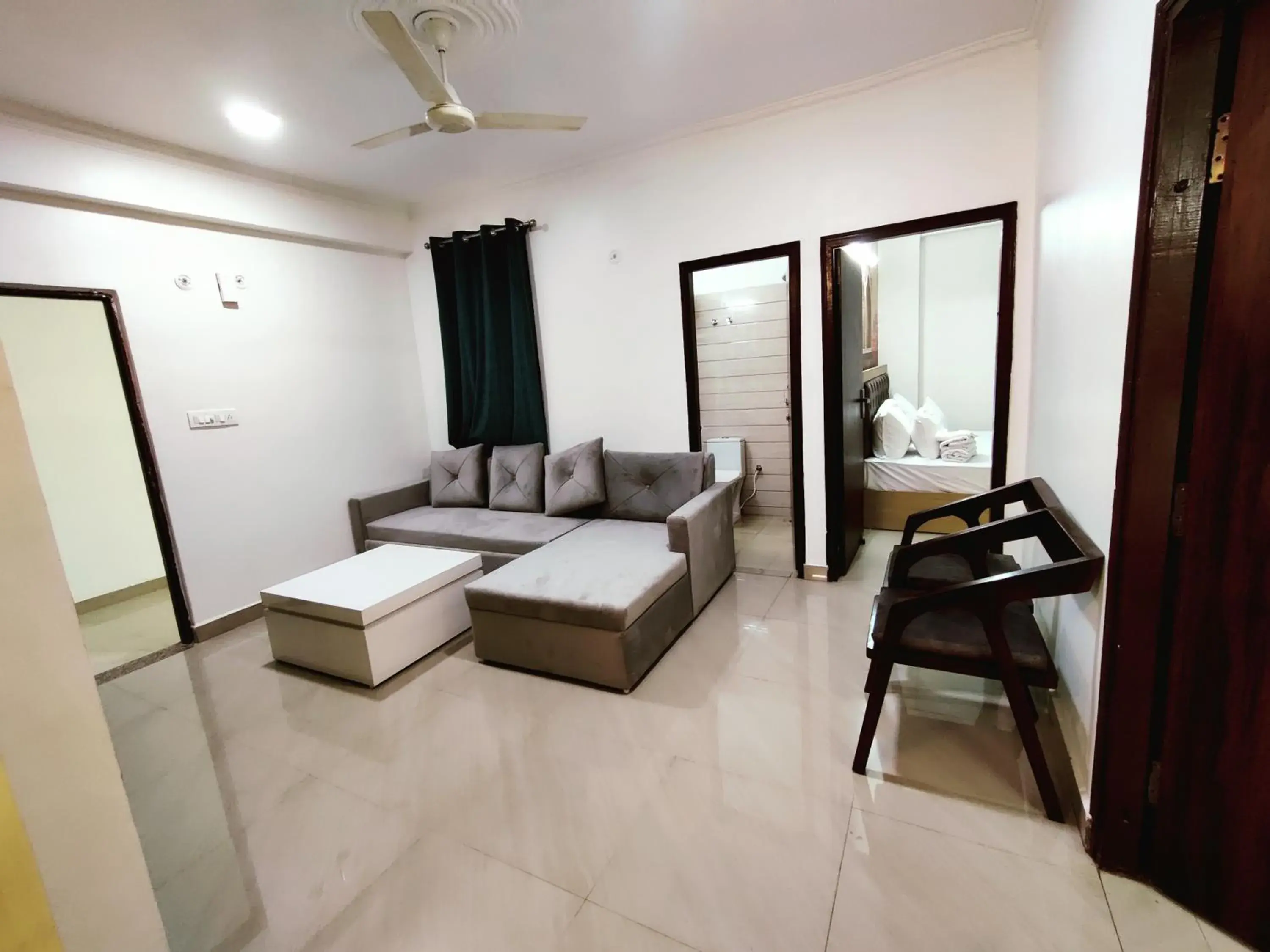 Living room, Bed in The Grand ND Resort- Kanha Tulsi Heights Behind Prem Mandir Living room, Bed in The Grand ND Resort- Kanha Tulsi Heights Behind Prem Mandir