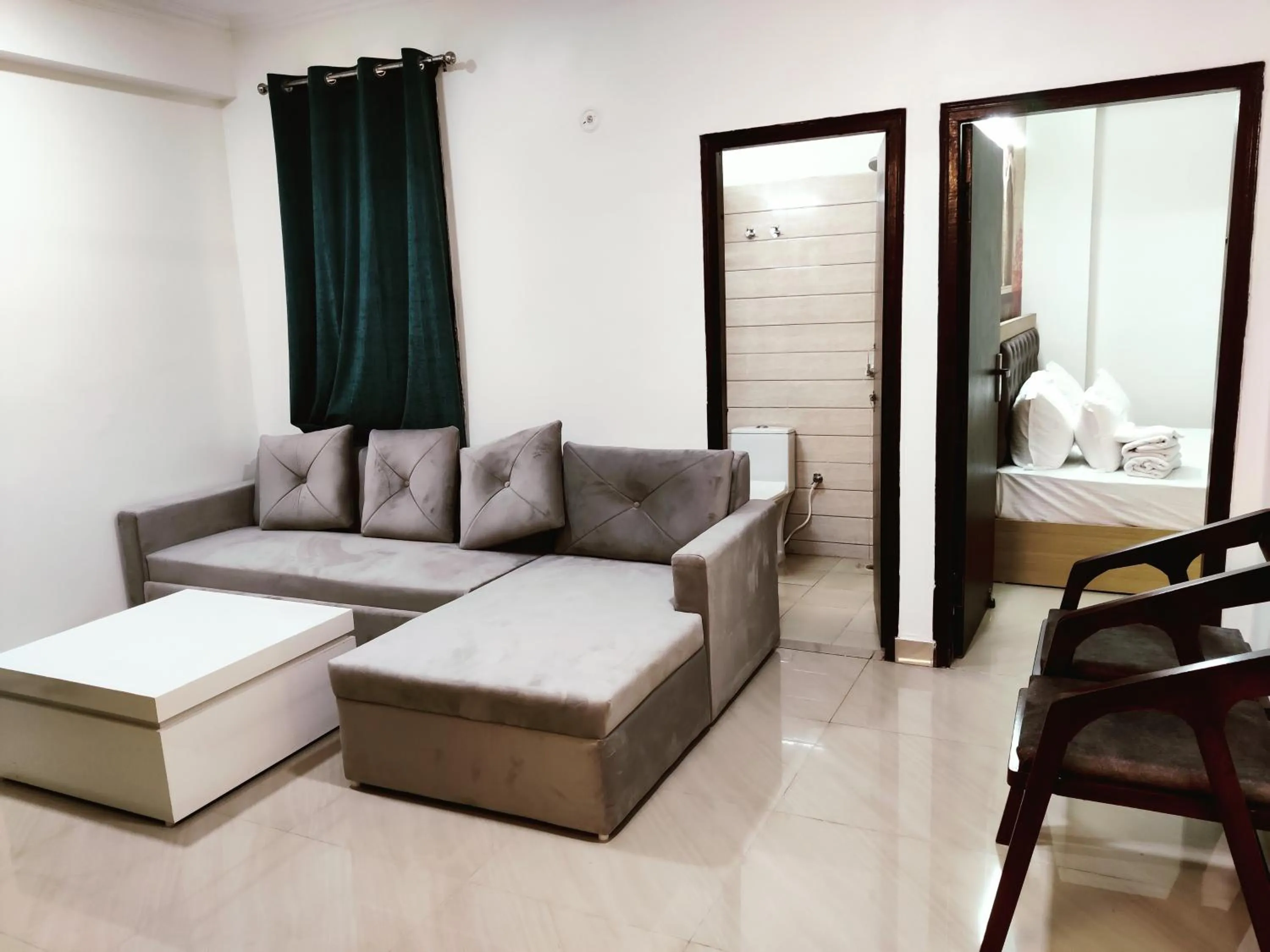 Living room, Bed in The Grand ND Resort- Kanha Tulsi Heights Behind Prem Mandir