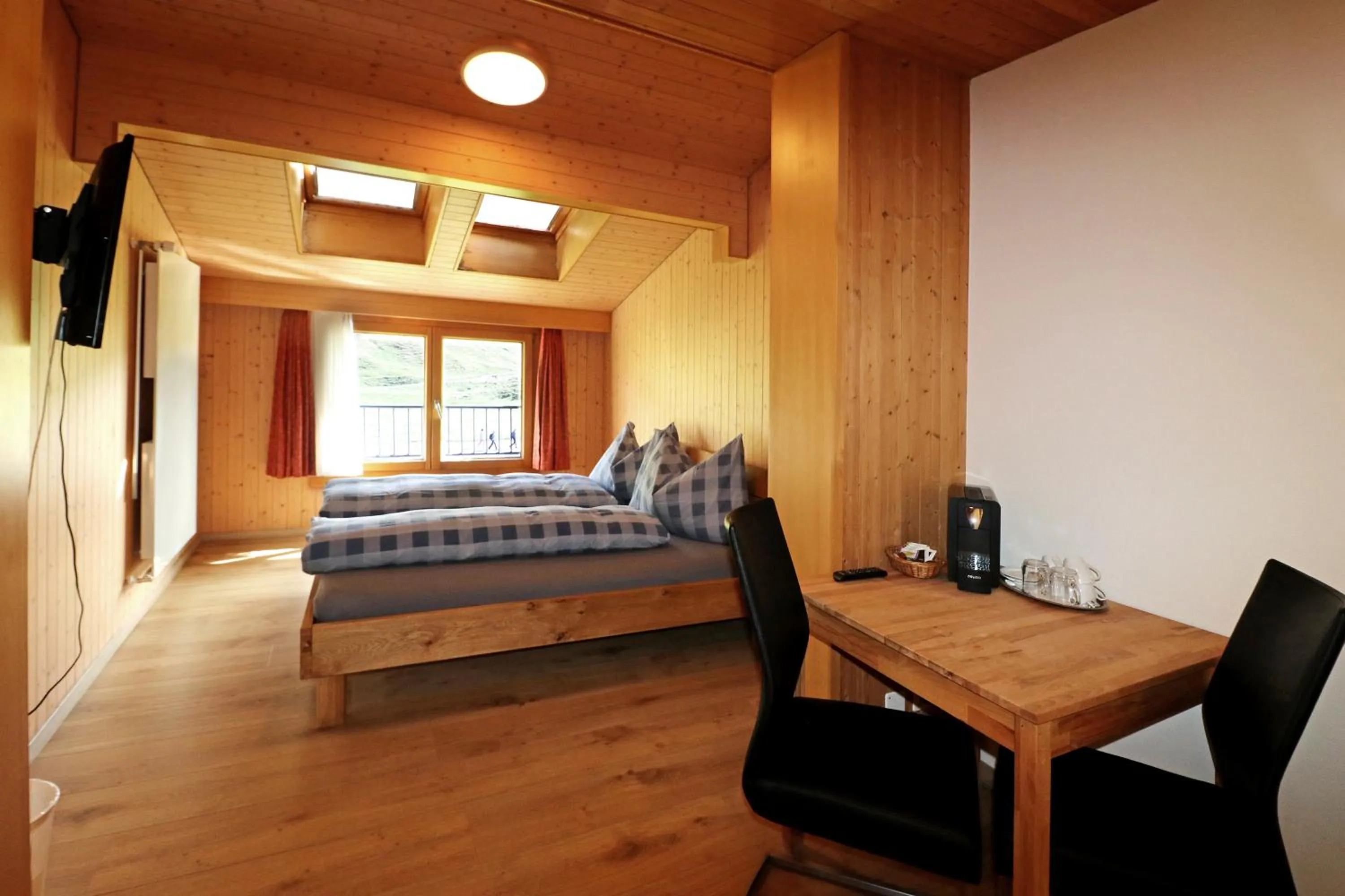 Bed in Berghotel Distelboden