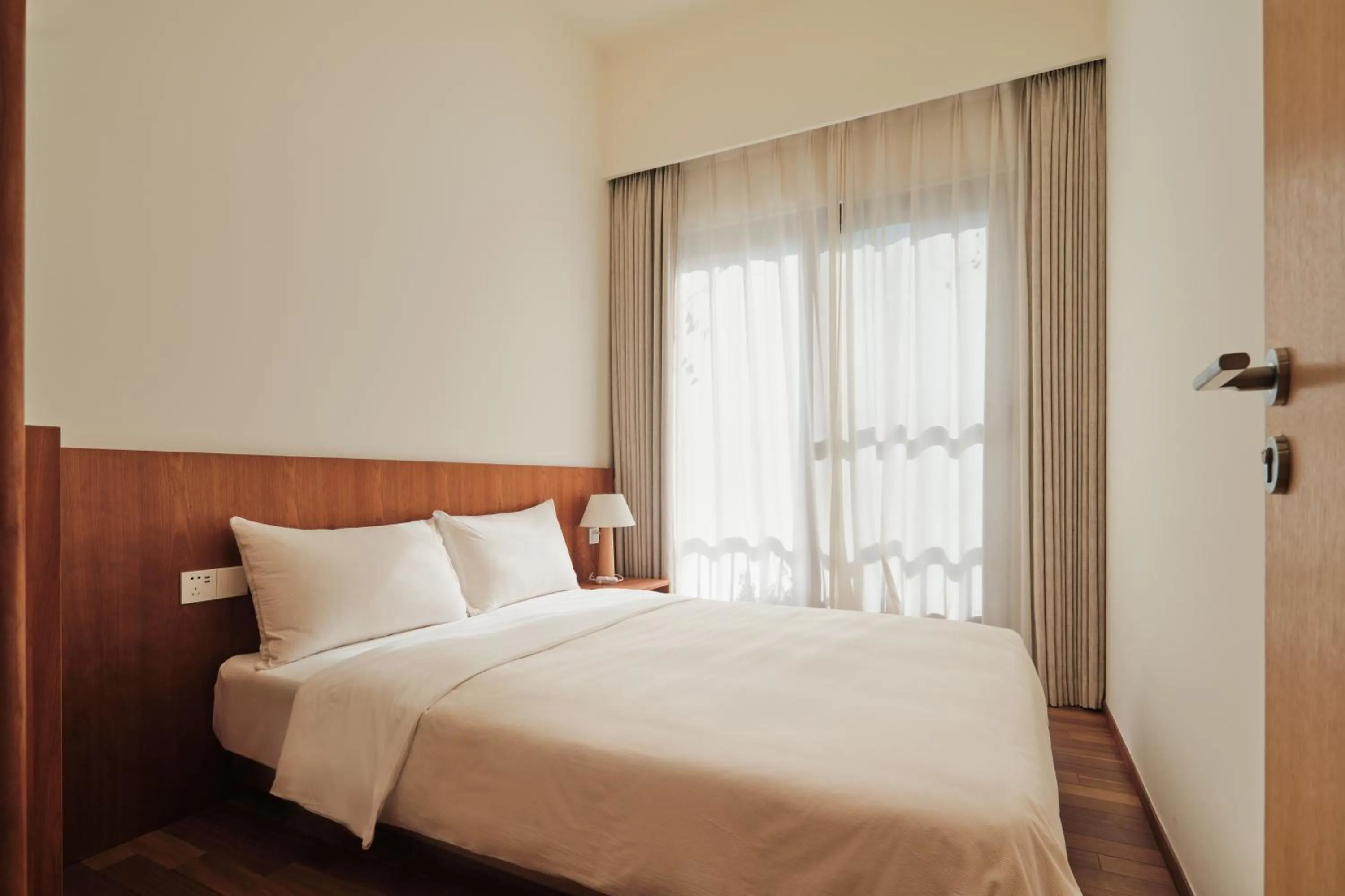 Bedroom, Bed in Wutong Hotel Apartment Bao'an Center