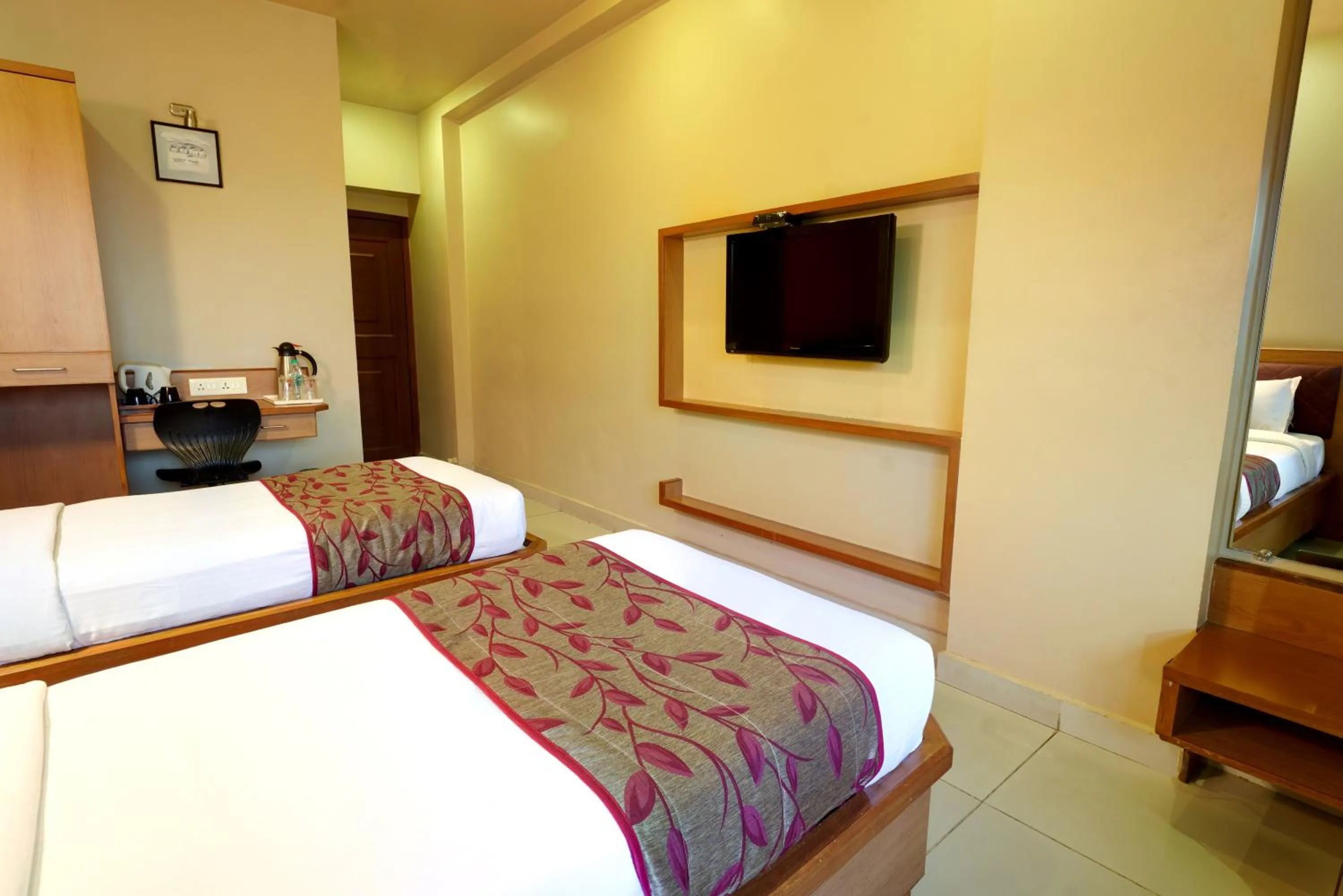TV and multimedia, Bed in Hotel Prestige, Mangalore