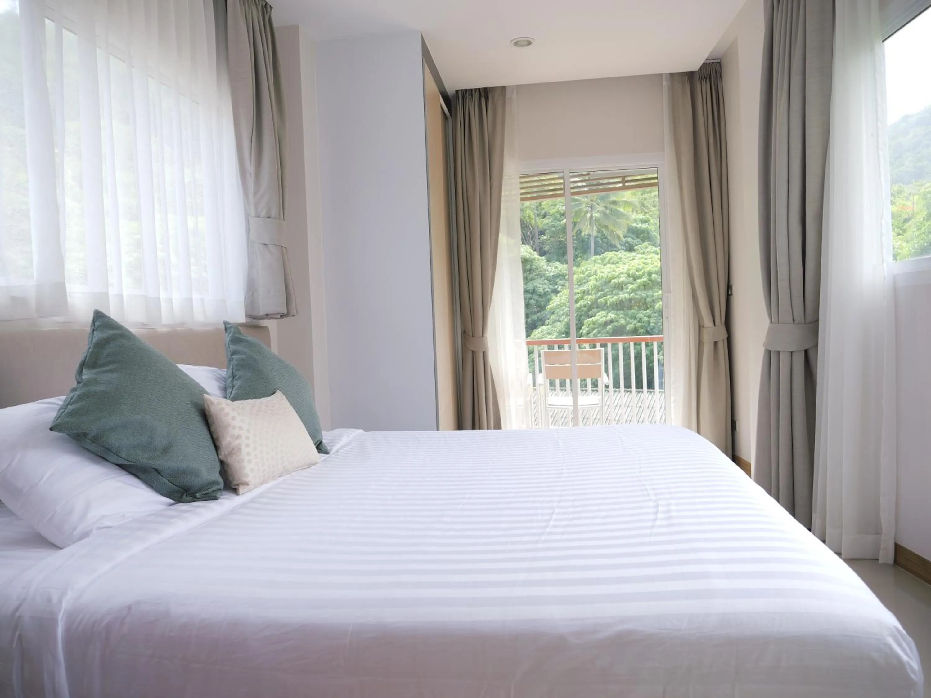 Bedroom, Bed in Karon beach apartment & sea view pool