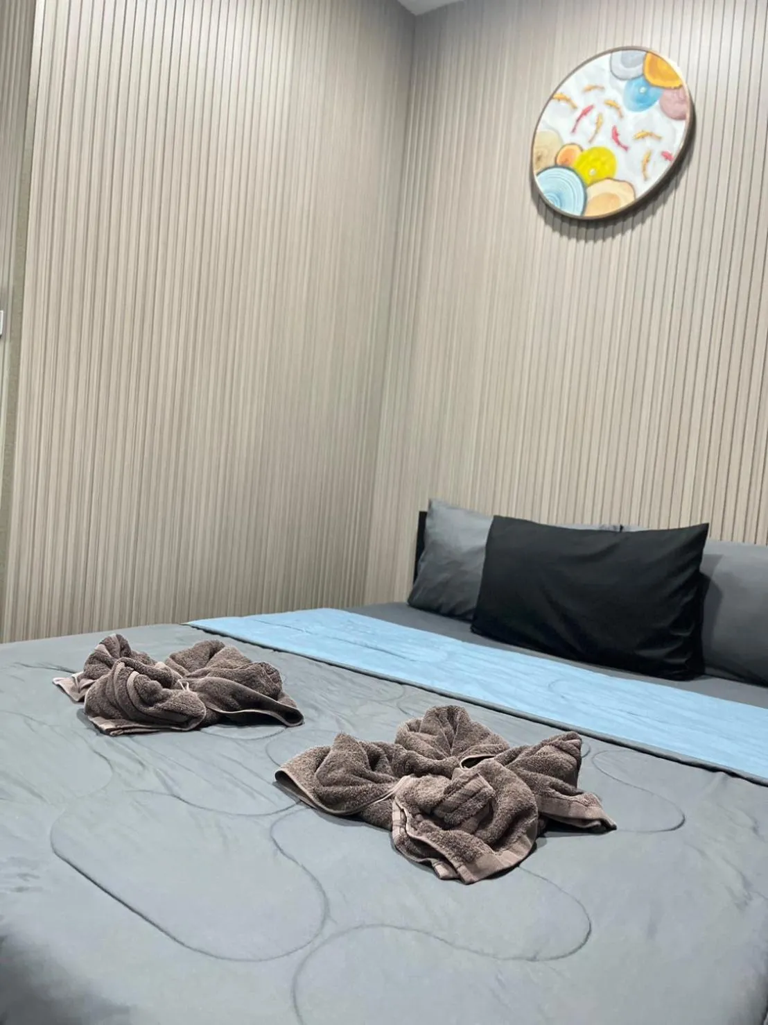 Bed in DonMueang station hotel