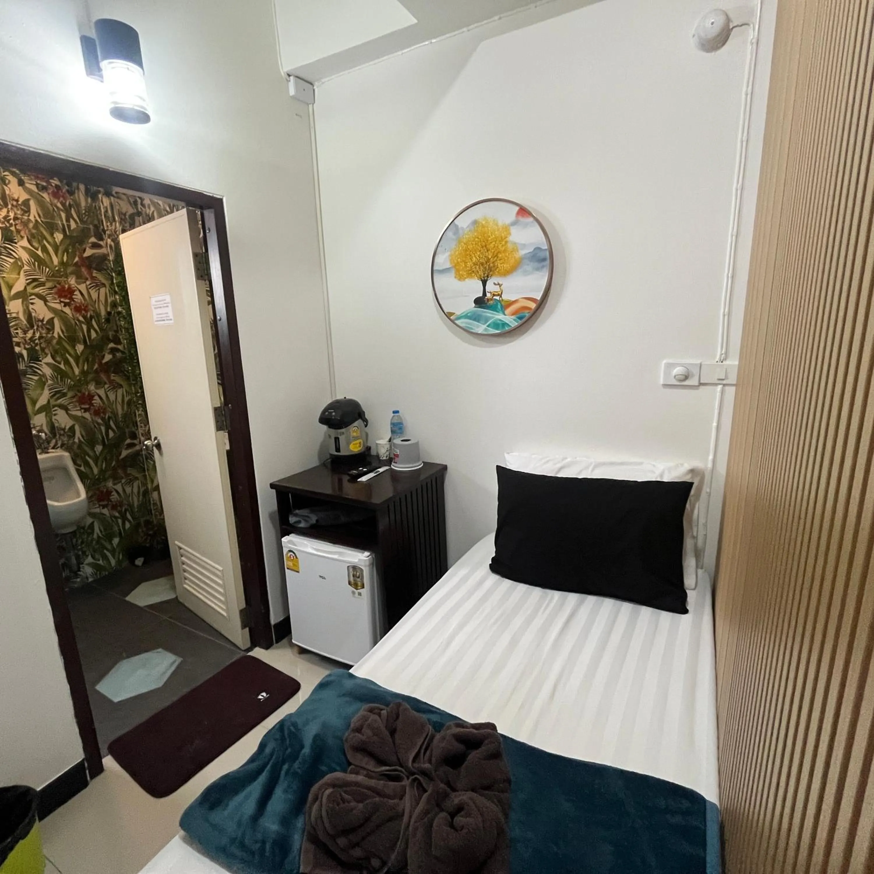 Bed in DonMueang station hotel