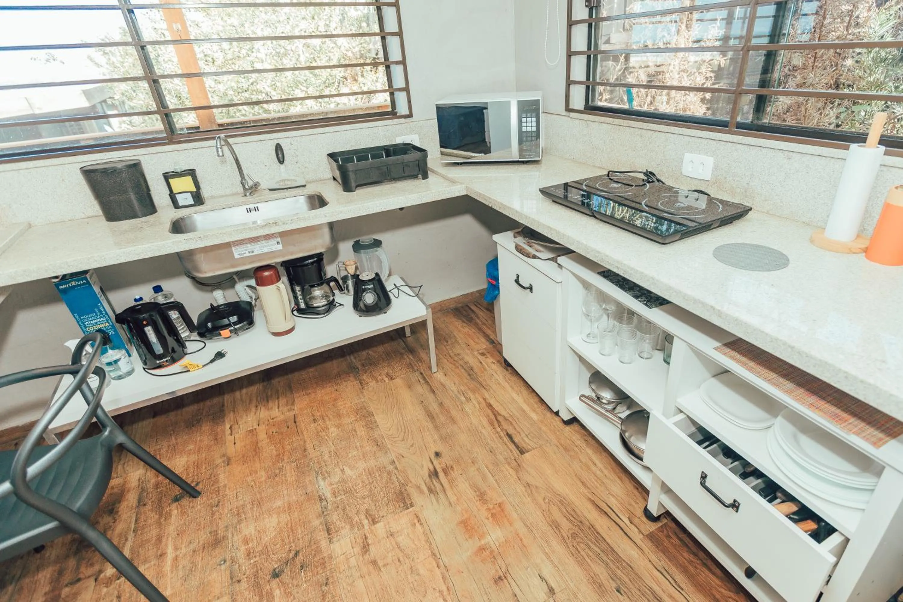 Kitchen or kitchenette in Chalés e Bangalôs Ibiraquera