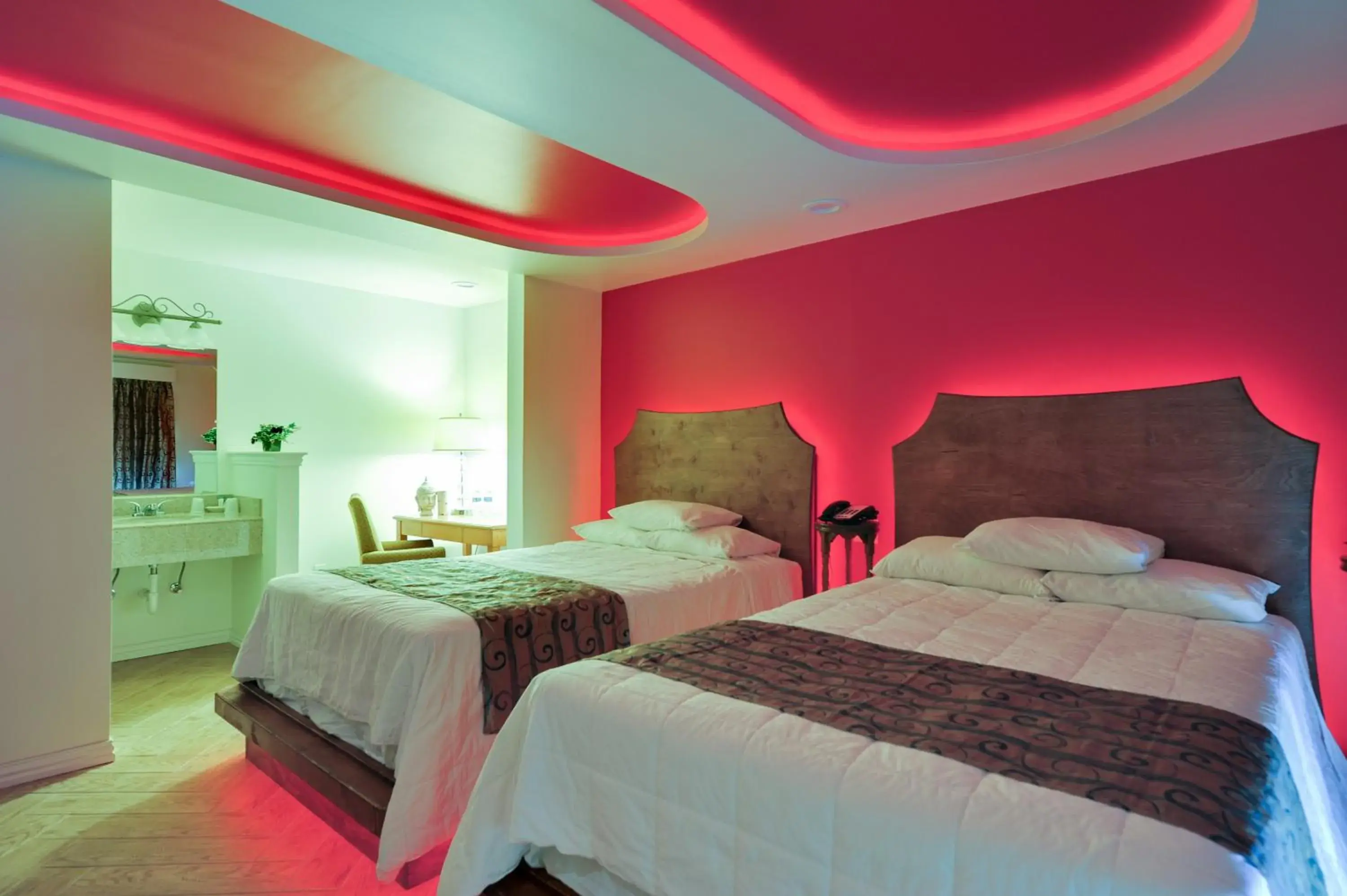 Bed in Romantic Inn & Suites
