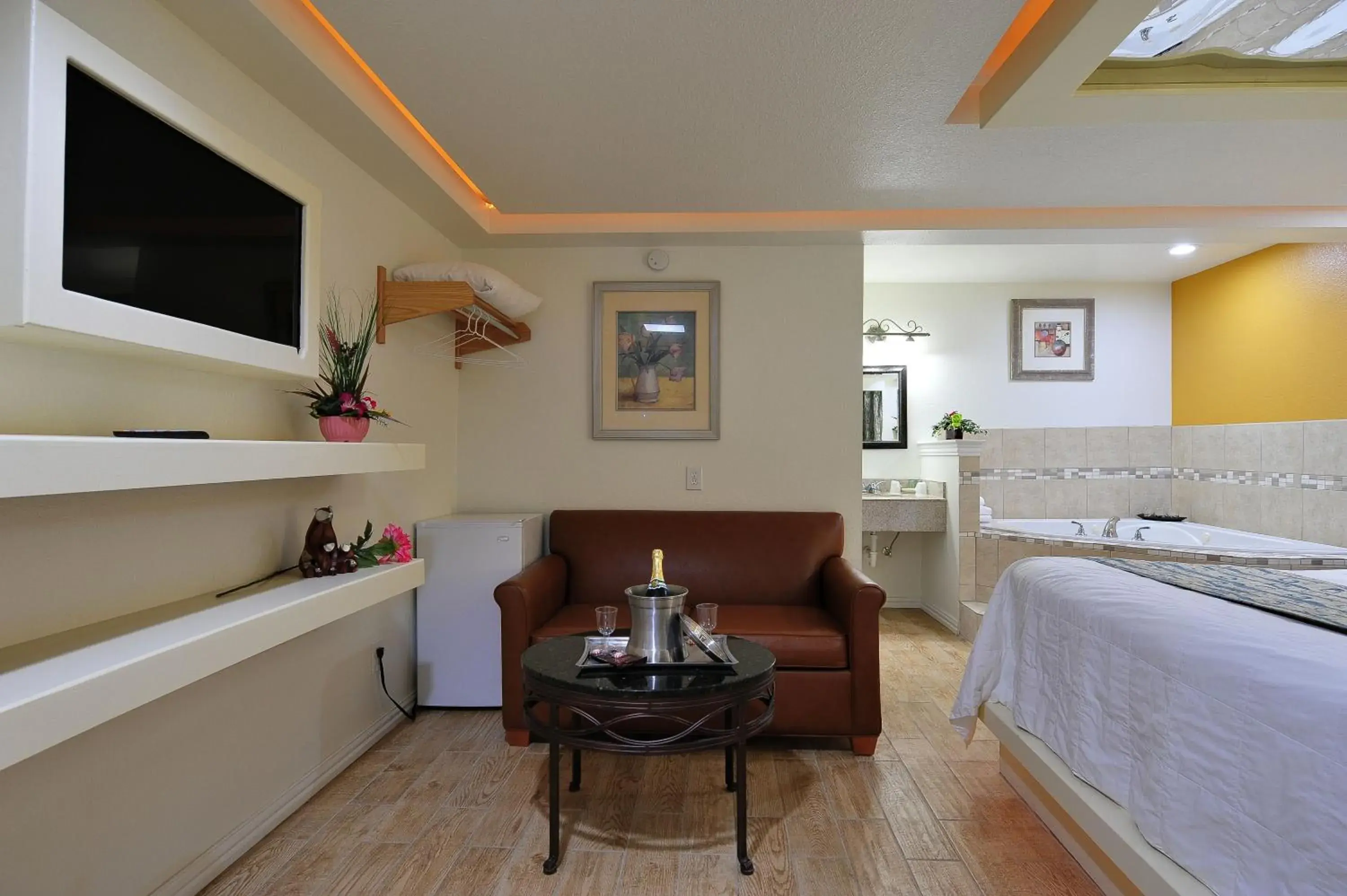 Bed in Romantic Inn & Suites