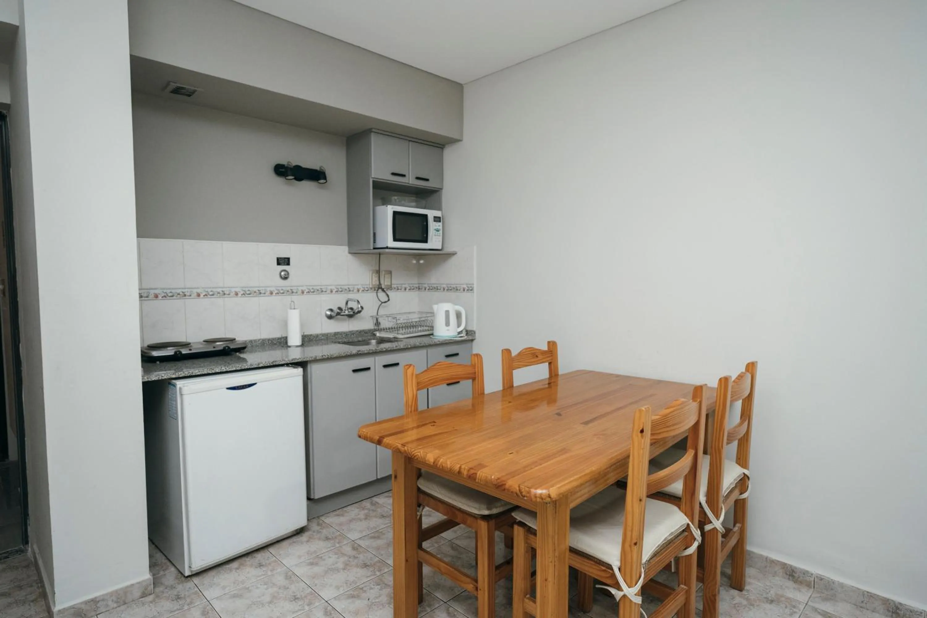 Kitchen or kitchenette in Patio Mediterraneo Apart Hotel