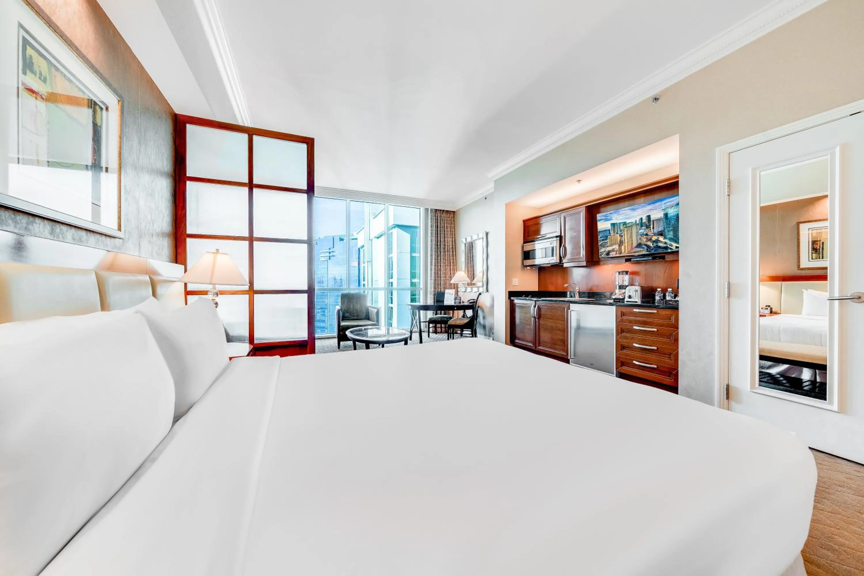 Bed in Jet Luxury at The Signature Condo Hotel